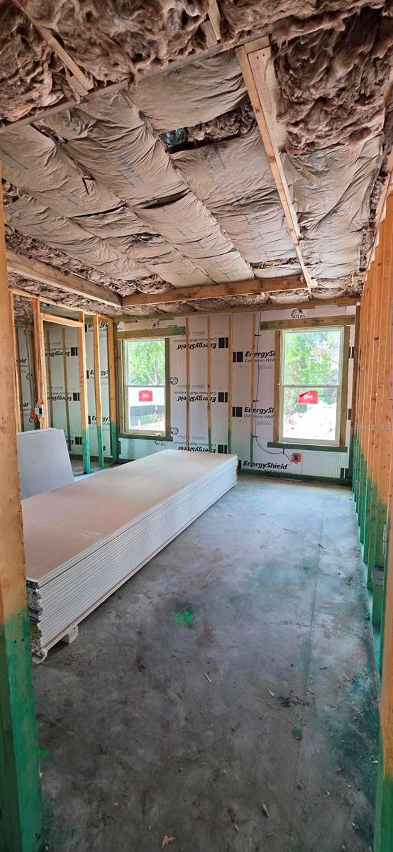 Primary bedroom, recessed ceiling, view of pool - 163 BRIDGEHAVEN DR, PALM COAST