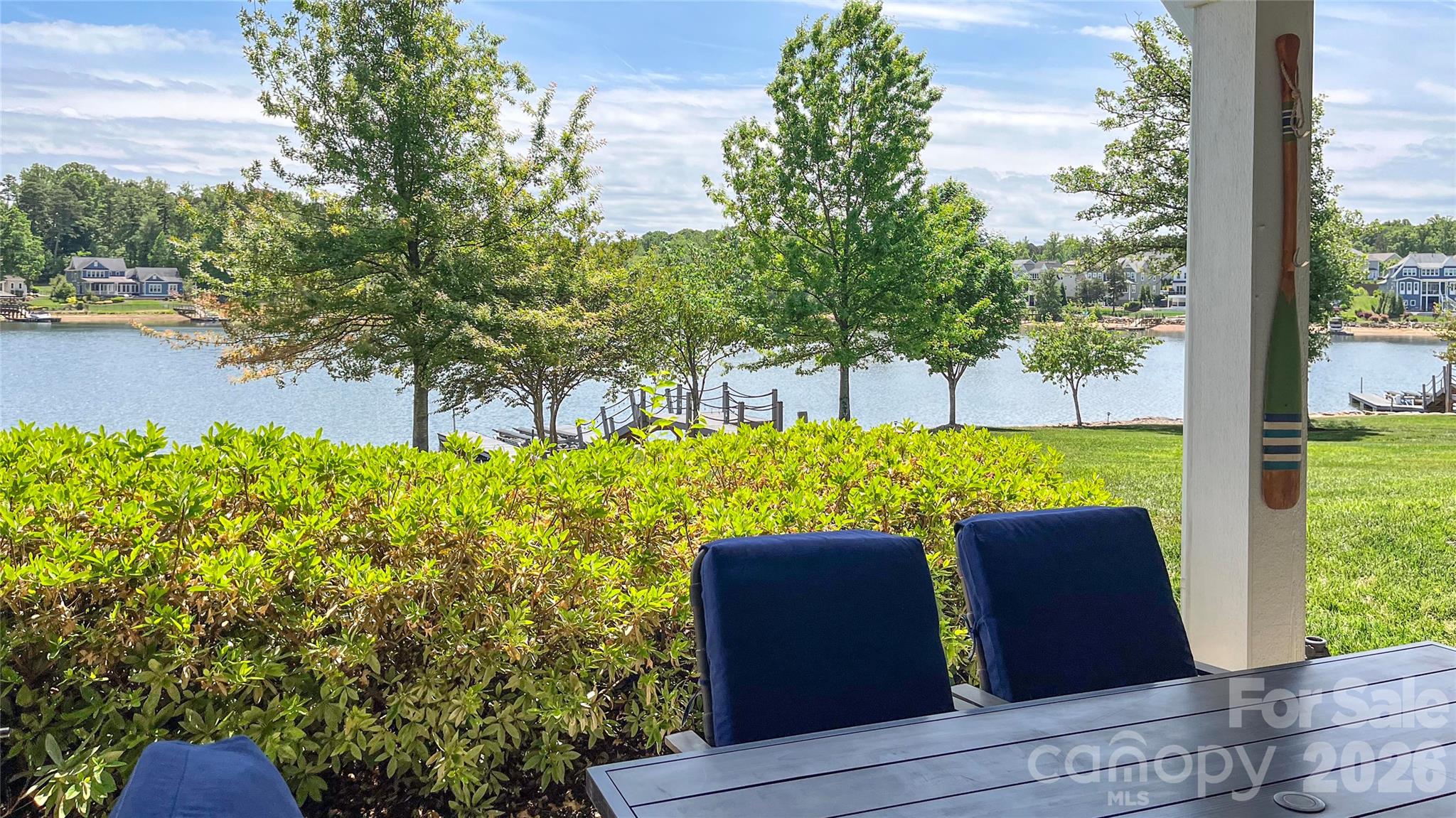 Covered patio from basement overlooking Lake Norman - 122 Sisters Cove Court, Mooresville