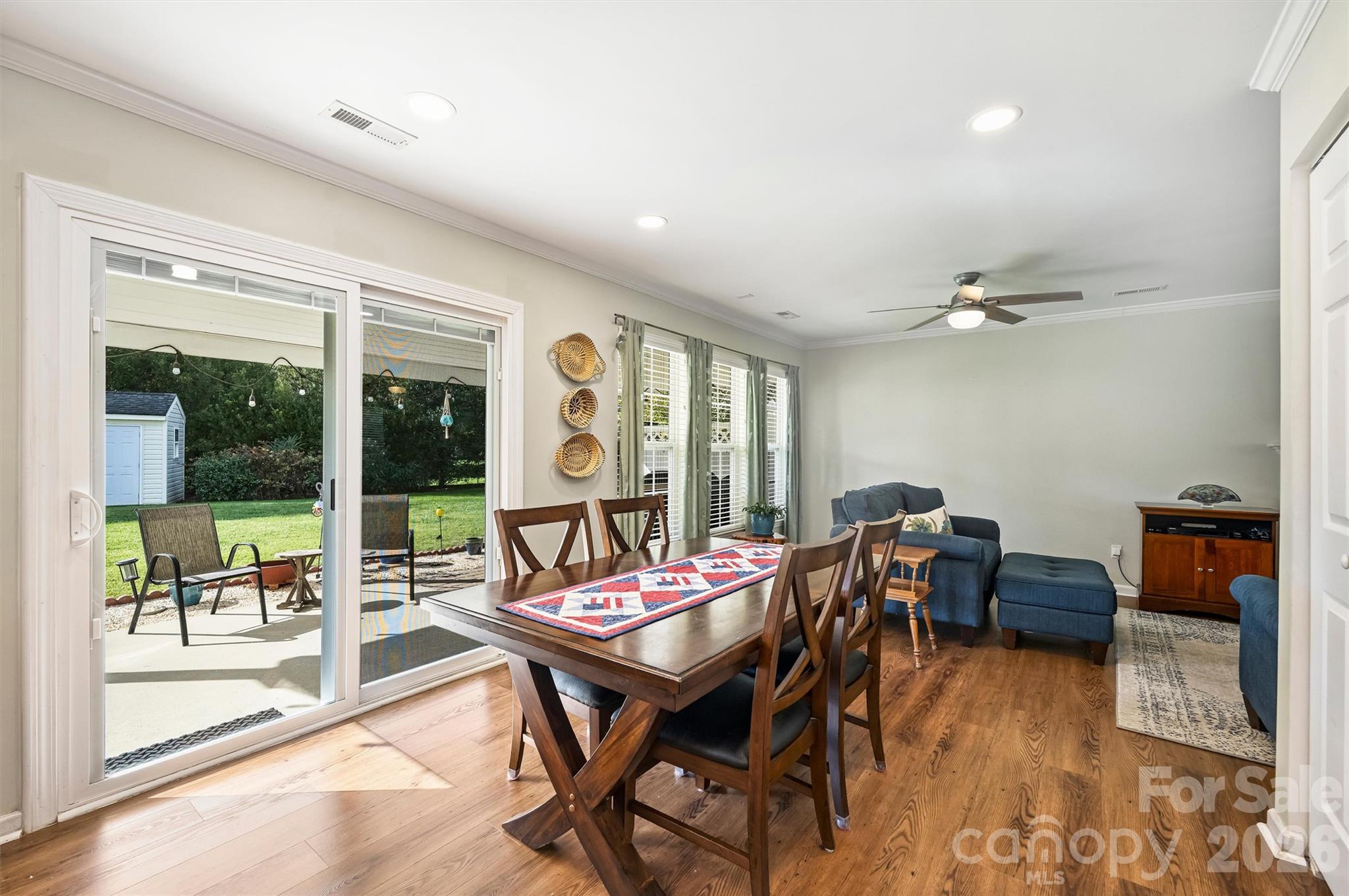 Dining area overlooks the lush back yard. - 1006 Banaba Court, Indian Trail