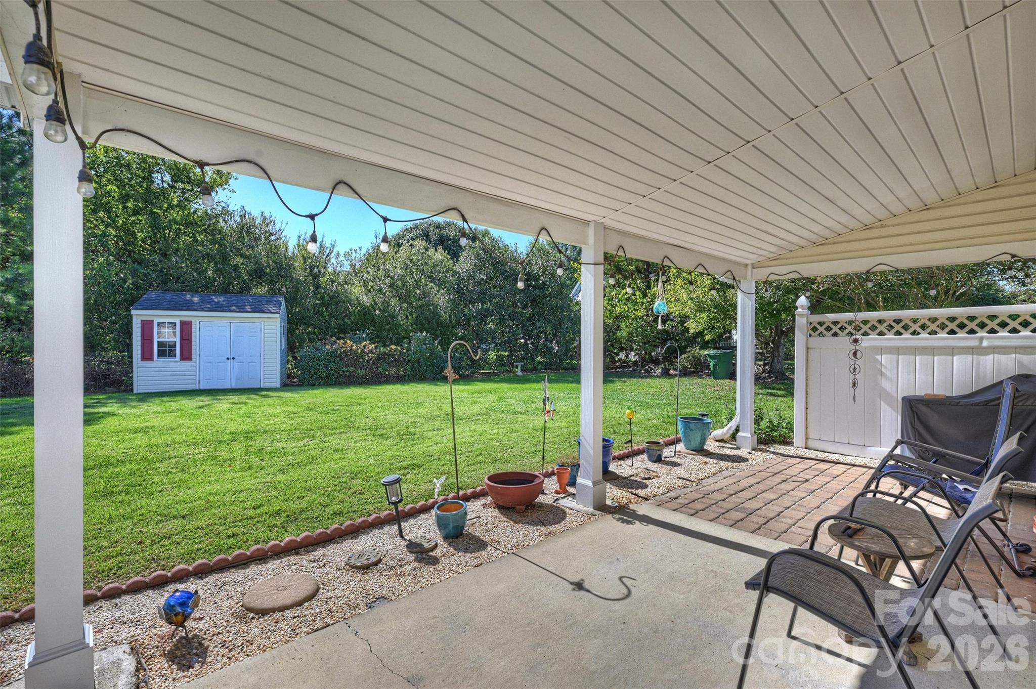 Relax and grill out on your shady covered patio. - 1006 Banaba Court, Indian Trail