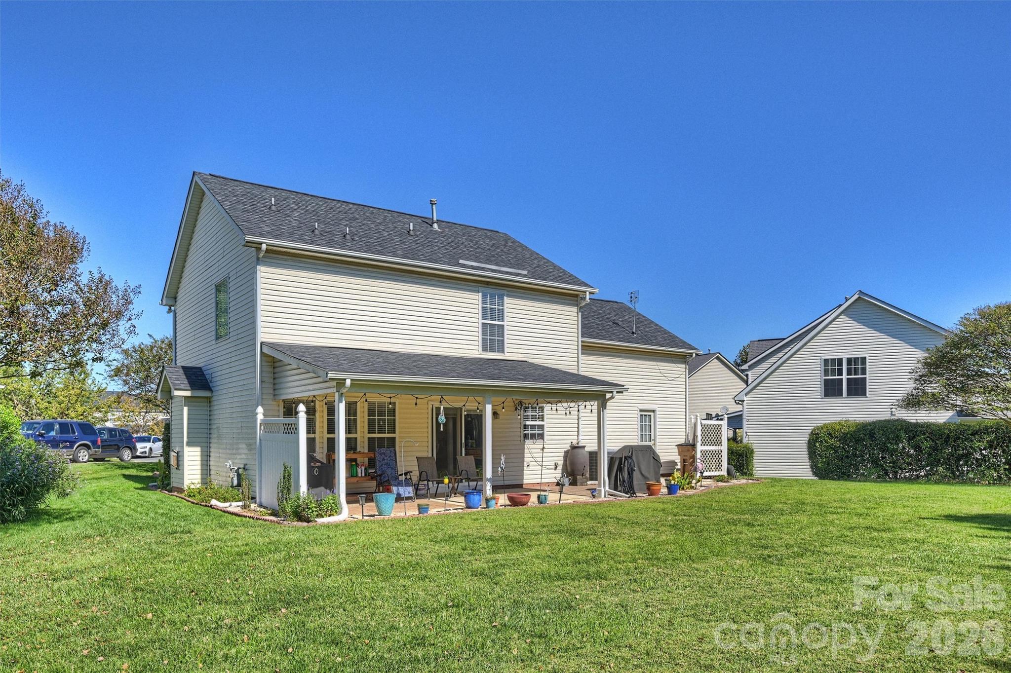 Relax and grill out on your shady covered patio. - 1006 Banaba Court, Indian Trail