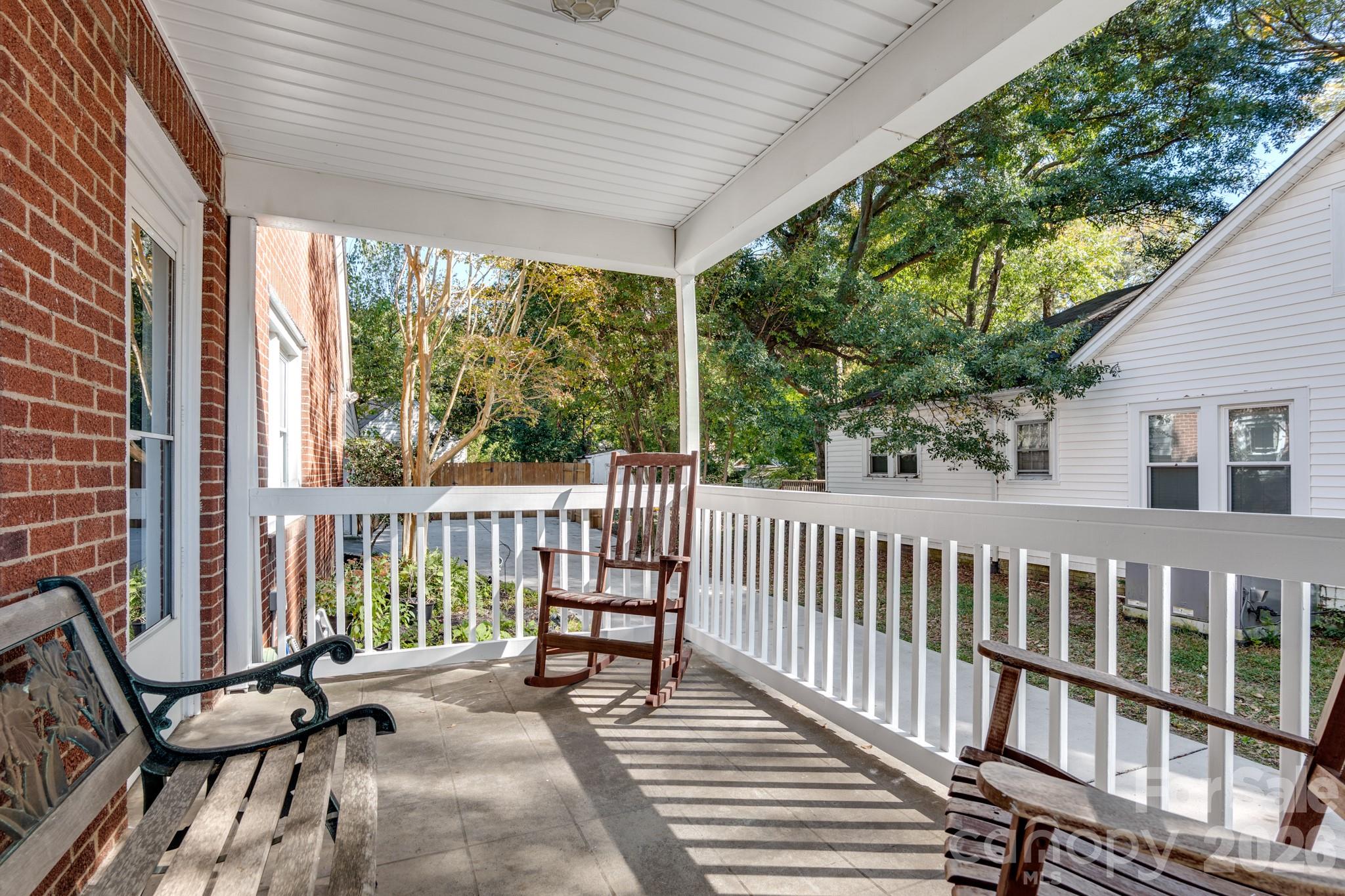 Side porch accessible from the living room - 736 Arbor Street NE, Concord