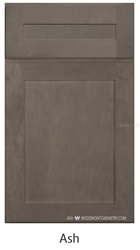 Kitchen Island & laundry room cabinets - 163 BRIDGEHAVEN DR, PALM COAST