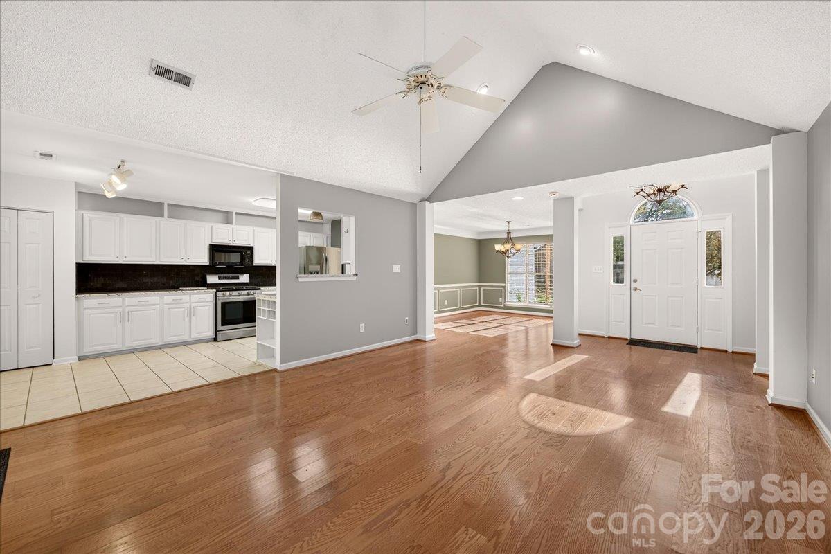 Open living/dining/kitchen - 9115 Pine Springs Court, Huntersville