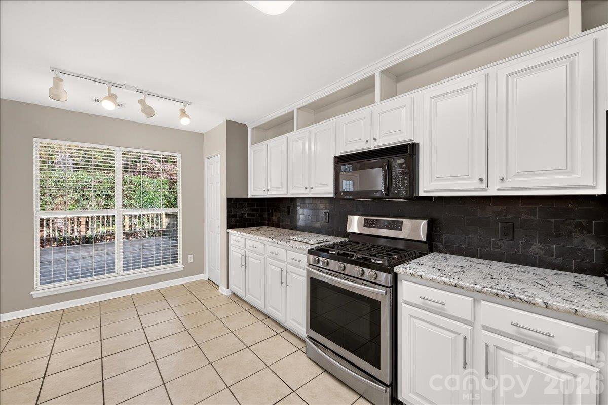 Picture window in kitchen with area for breakfast nook. - 9115 Pine Springs Court, Huntersville