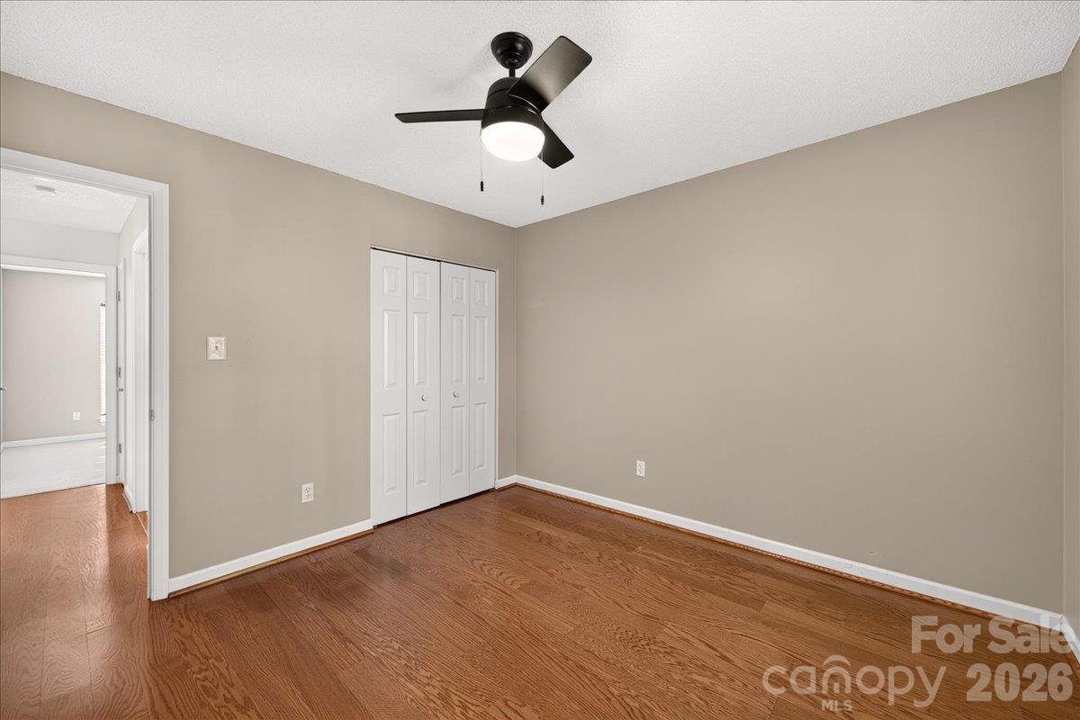 3rd Bedroom laminate wood flooring - 9115 Pine Springs Court, Huntersville