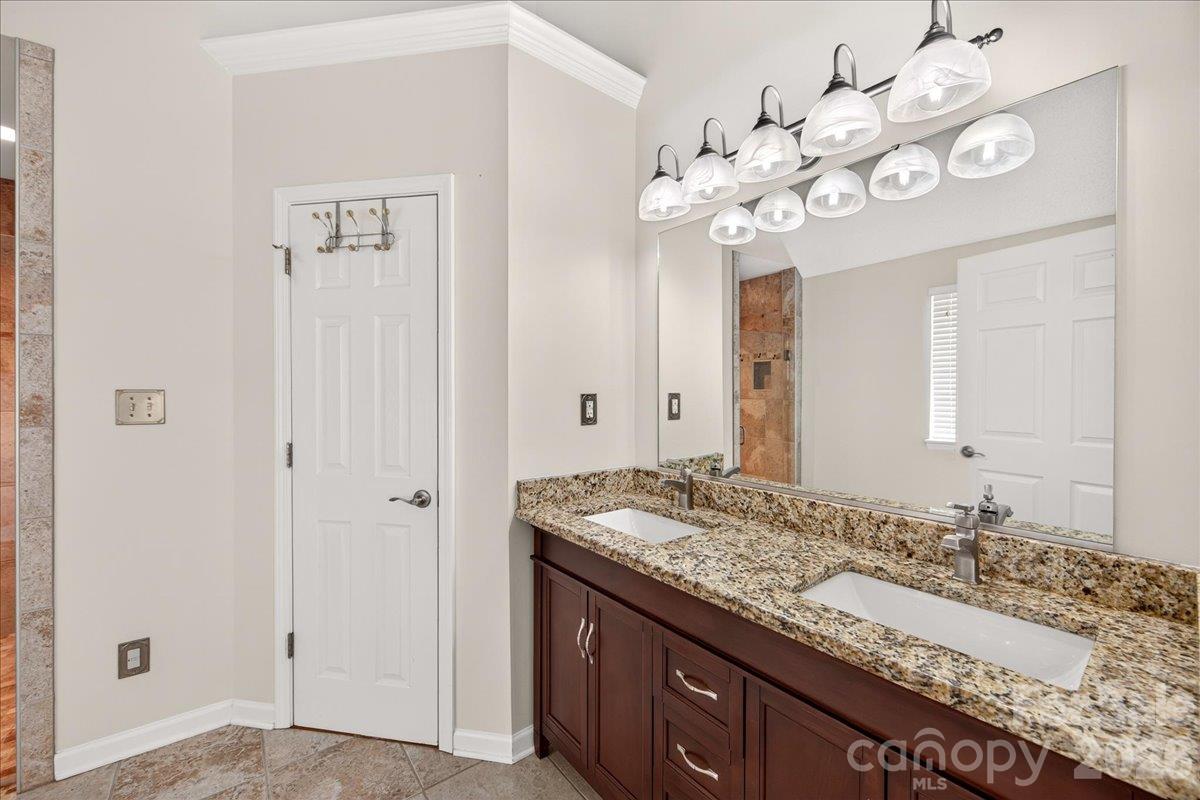Double vanity in primary bathroom - 9115 Pine Springs Court, Huntersville
