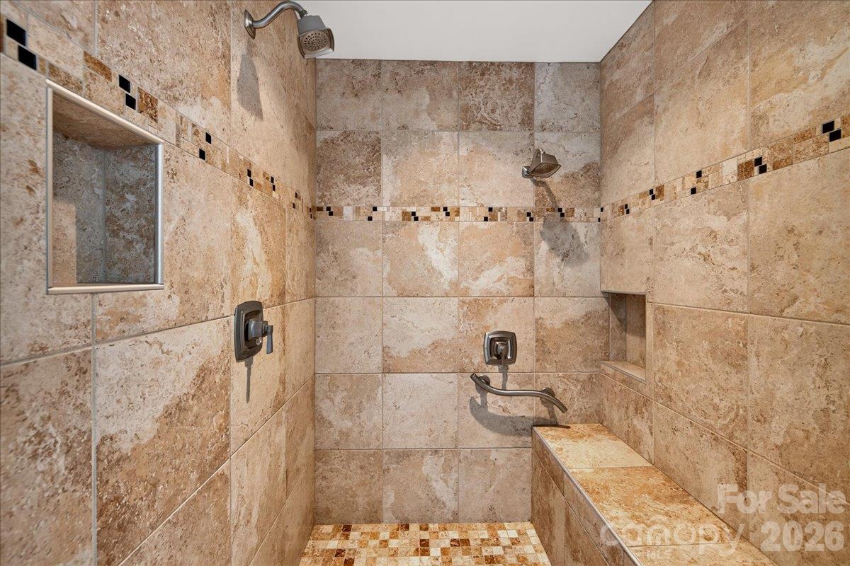 Custom shower with  zero entry, bench seat and grab bars - 9115 Pine Springs Court, Huntersville