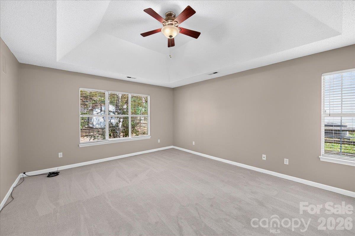 Primary bedroom with great lighting - 9115 Pine Springs Court, Huntersville