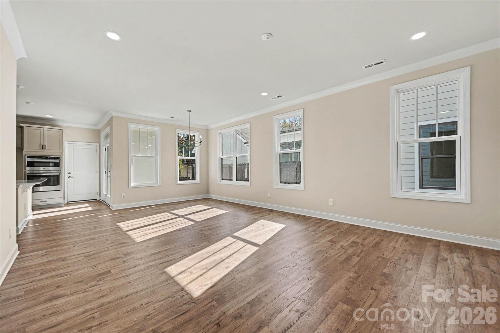 Lots of light in the main living areas - 10225 Rainier Trail Drive NW, Huntersville