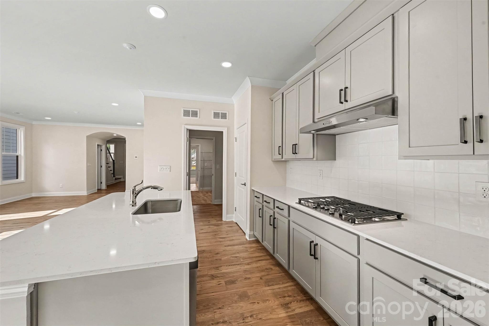Laundry room connects off the kitchen - 10225 Rainier Trail Drive NW, Huntersville
