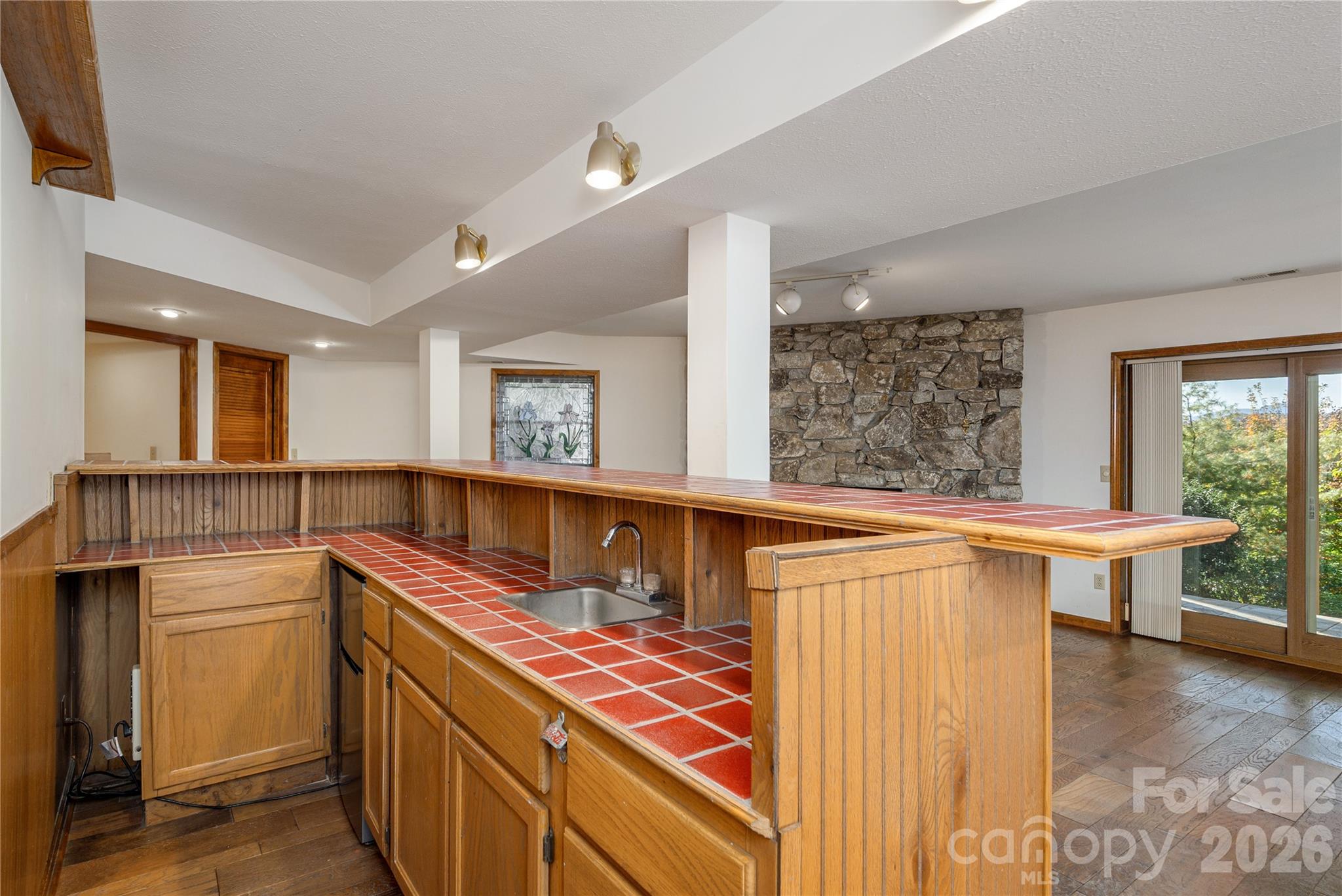 Downstairs living area w/ bar area - 20 Wild Cherry Drive, Mills River