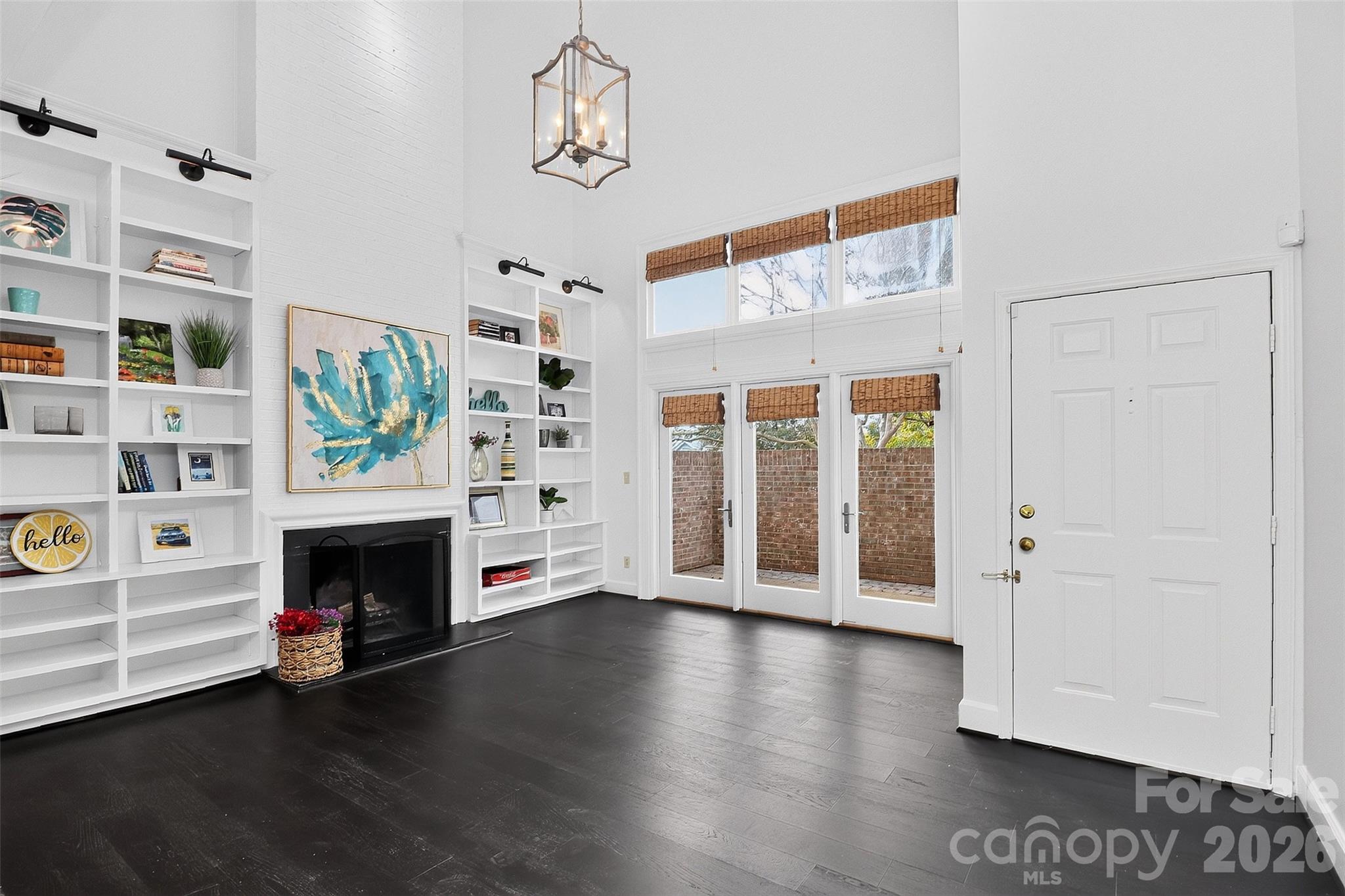 Living room and front door - 8254 Tradd Court, Charlotte