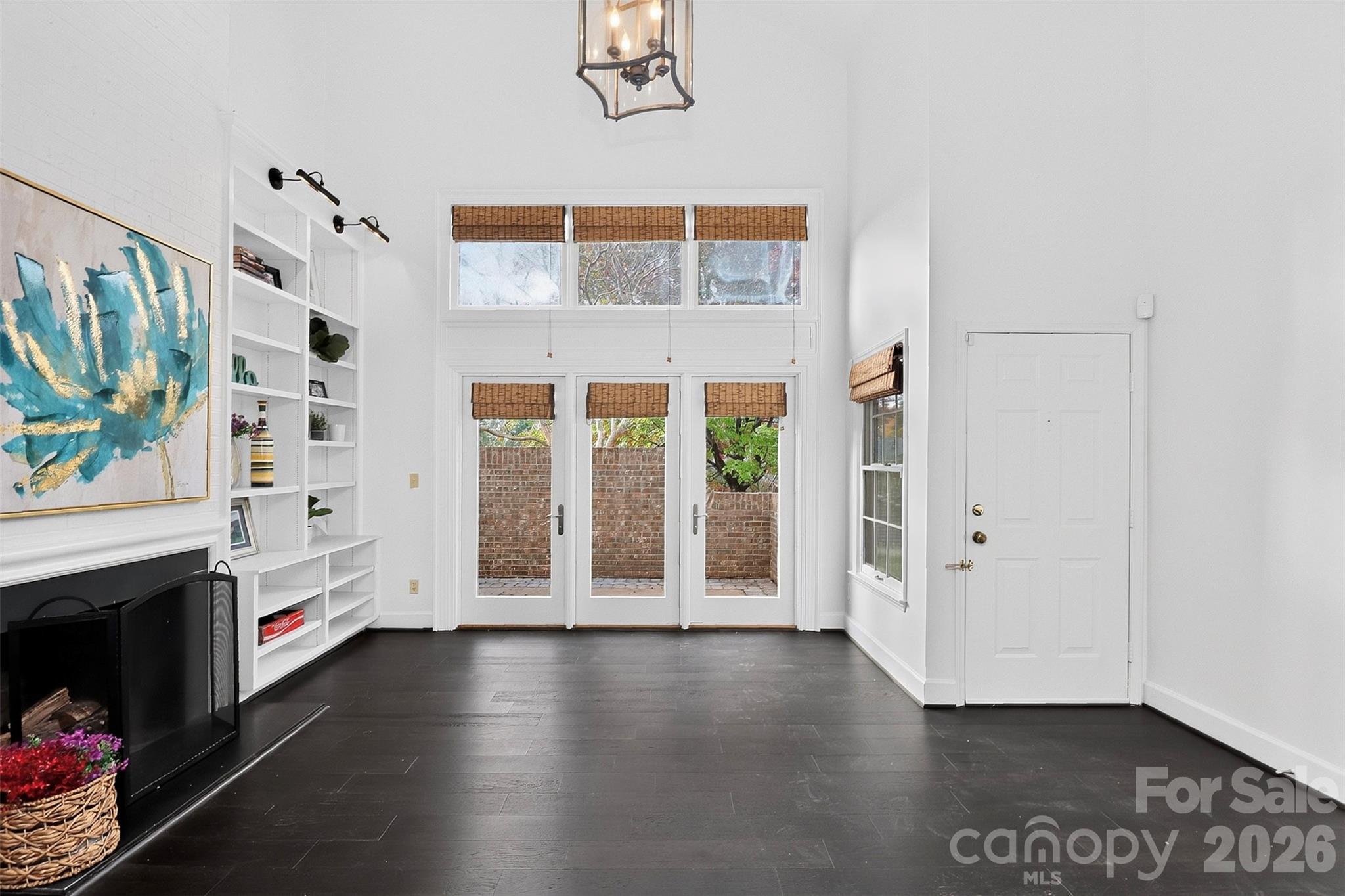 Glass doors to private front courtyard - 8254 Tradd Court, Charlotte