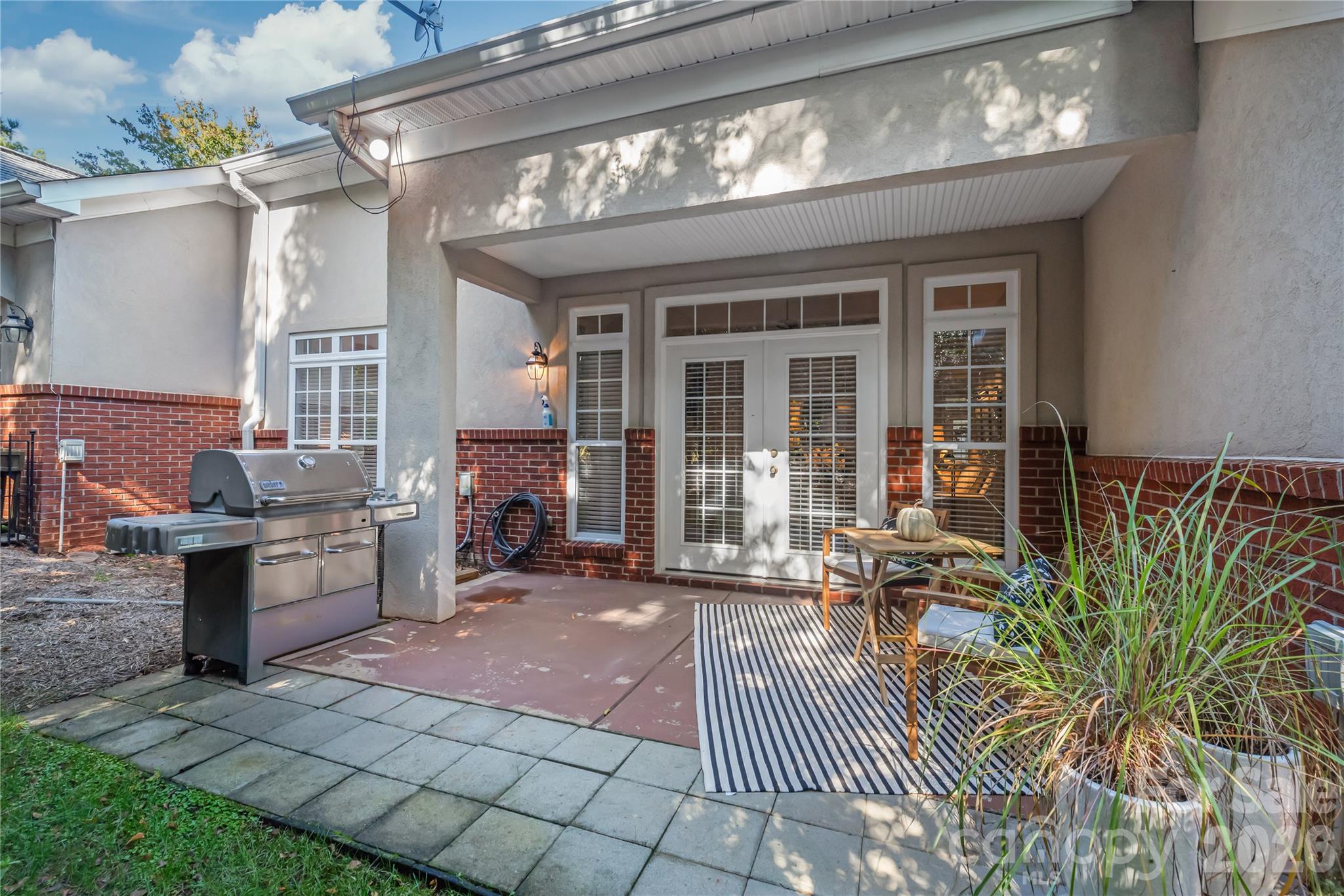 Large back covered patio - 8833 Legacy Lake Lane, Charlotte