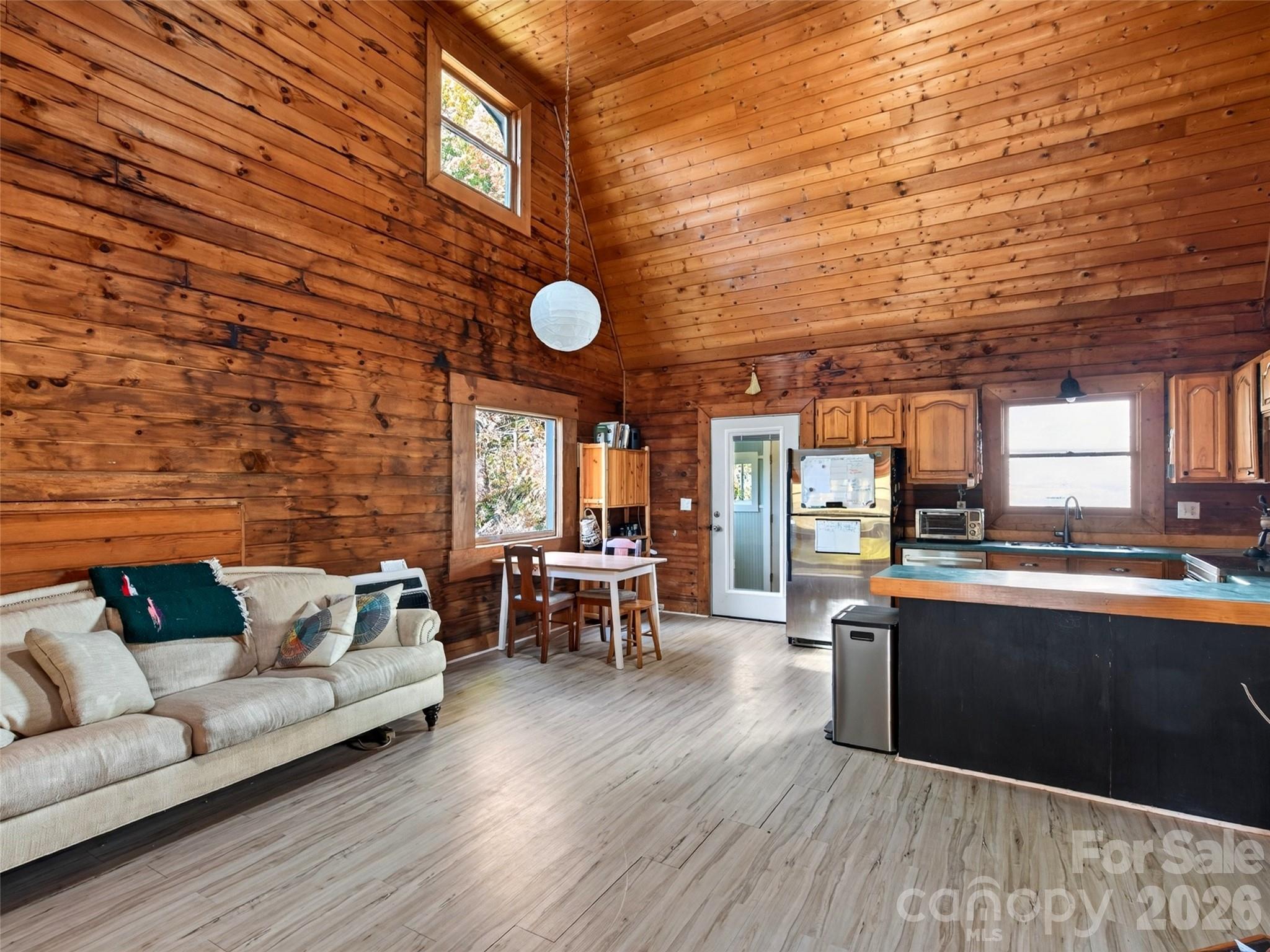 Open living space with vaulted ceiling - 335 Moody Cove Road, Weaverville