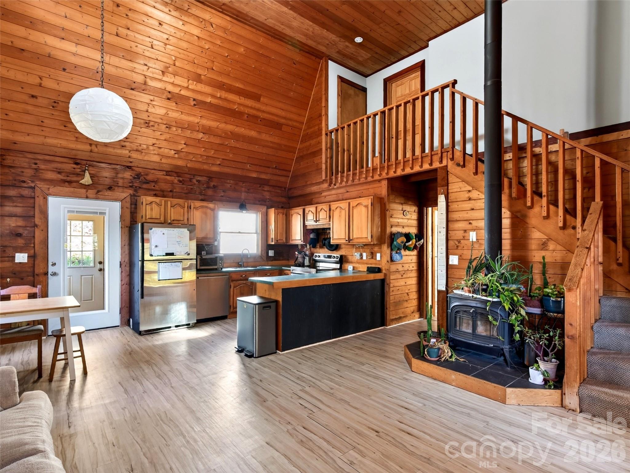 Open living space with vaulted ceiling - 335 Moody Cove Road, Weaverville