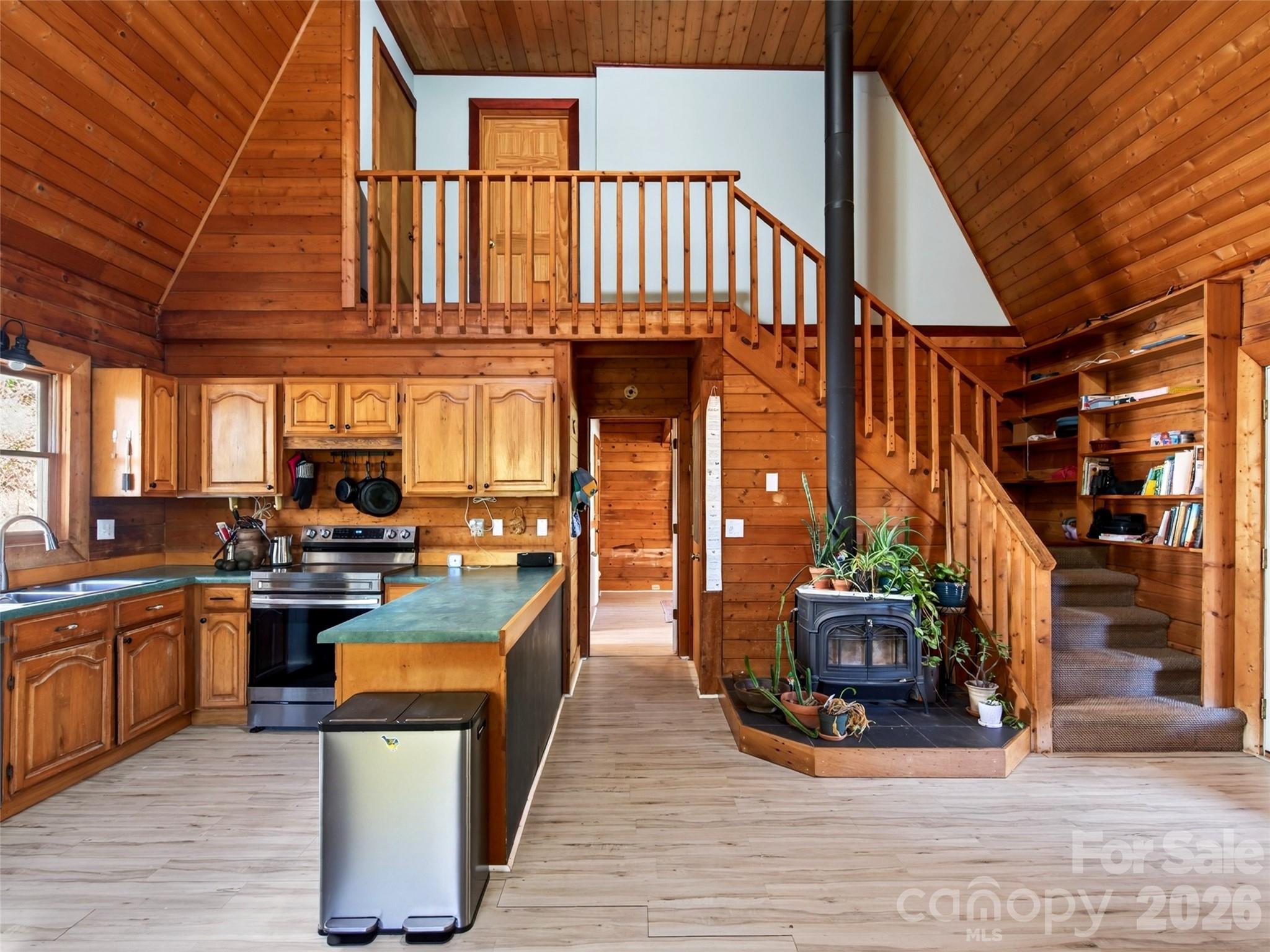 Kitchen and wood burning stove - 335 Moody Cove Road, Weaverville
