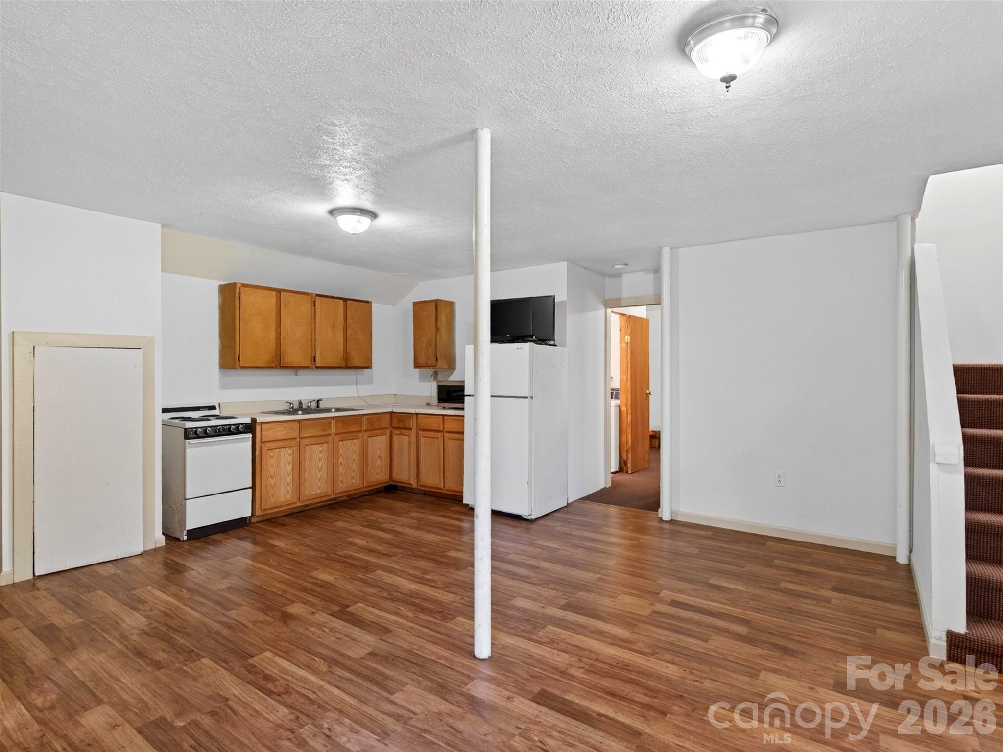 Lower level kitchenette and additional living space - 335 Moody Cove Road, Weaverville