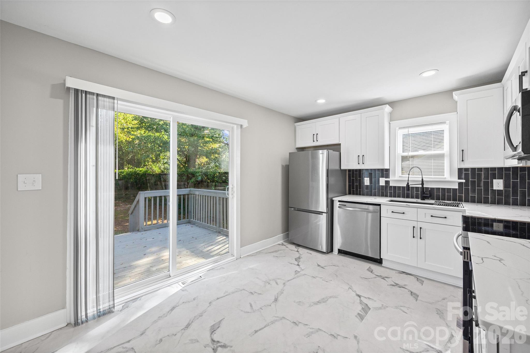 Kitchen facing backyard - 1603 Browns Avenue, Charlotte
