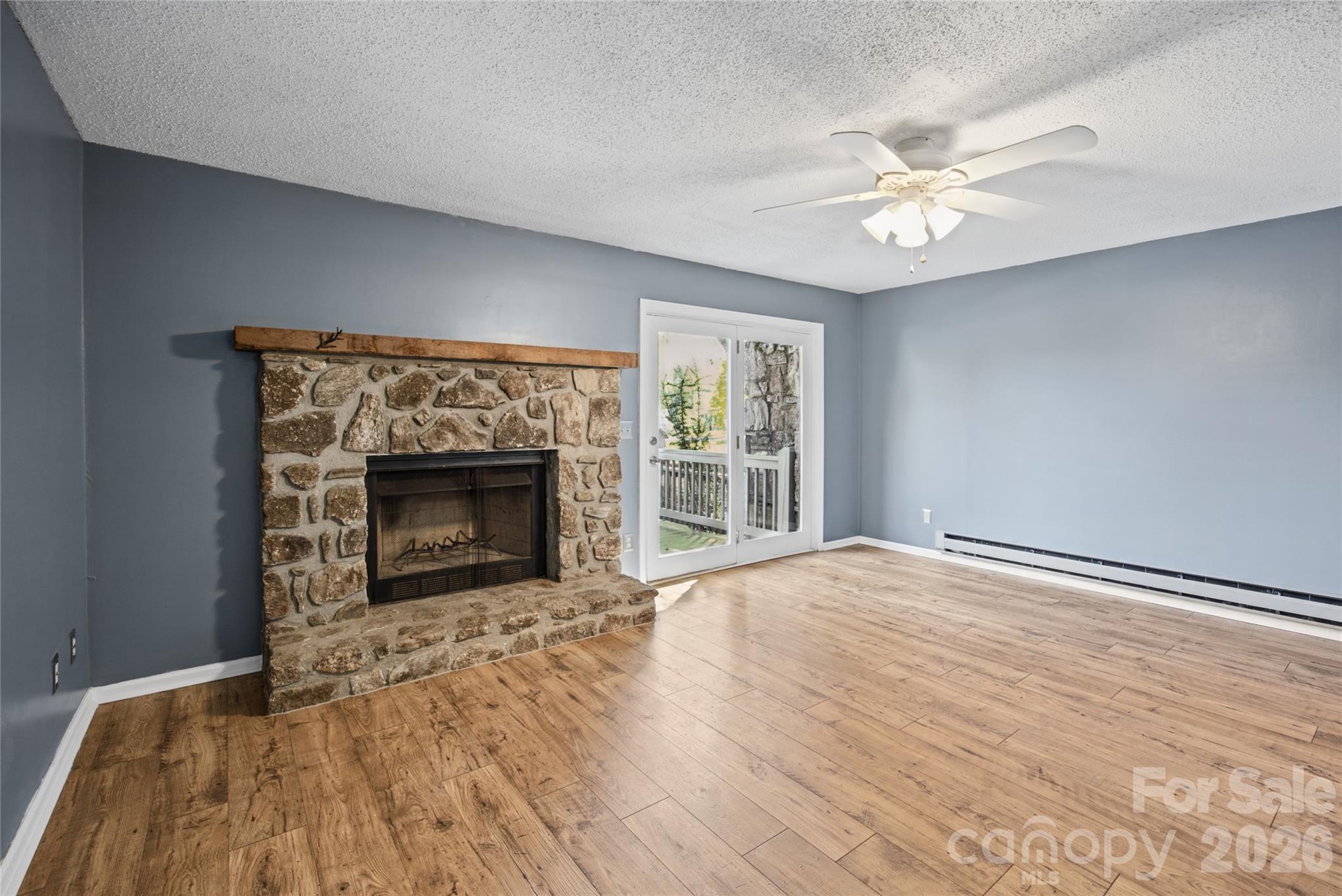 Living room with fireplace - 85 Wildflower Lane, Waynesville