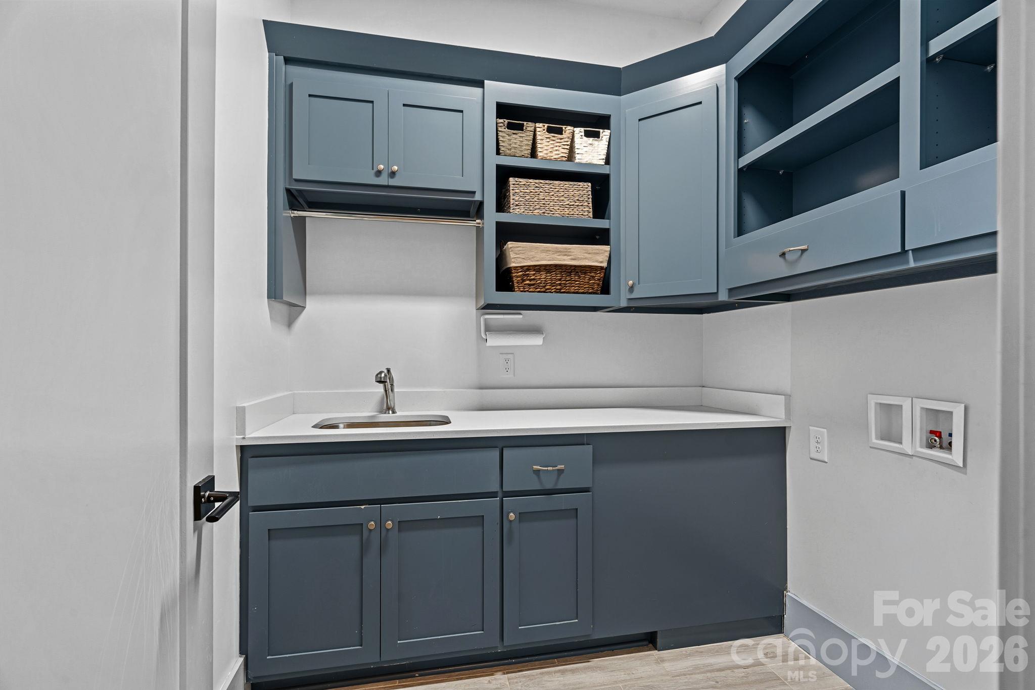 Laundry With Access To Primary Closet and Hallway - 6536 Stephens Road, Huntersville
