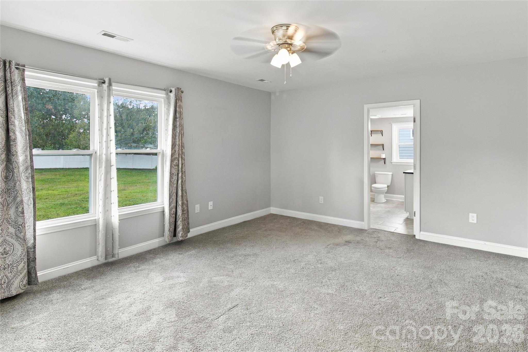 Primary bedroom with bathroom - 609 Little Texas Road, Kannapolis