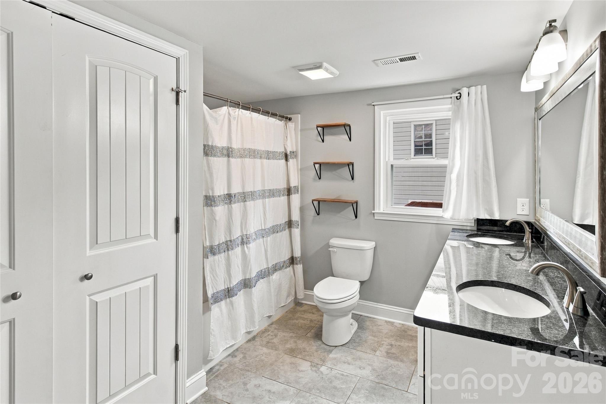 Primary bathroom with double vanity - 609 Little Texas Road, Kannapolis