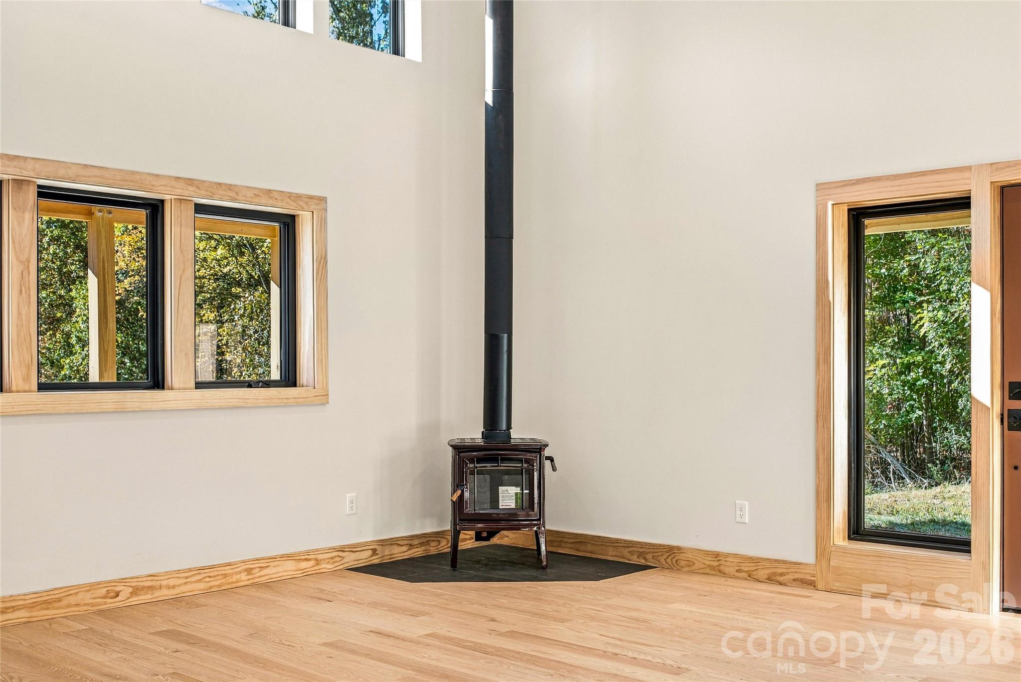 Premium HearthStone wood stove adds warmth and character. - 205 Blue Moon Lane, Candler