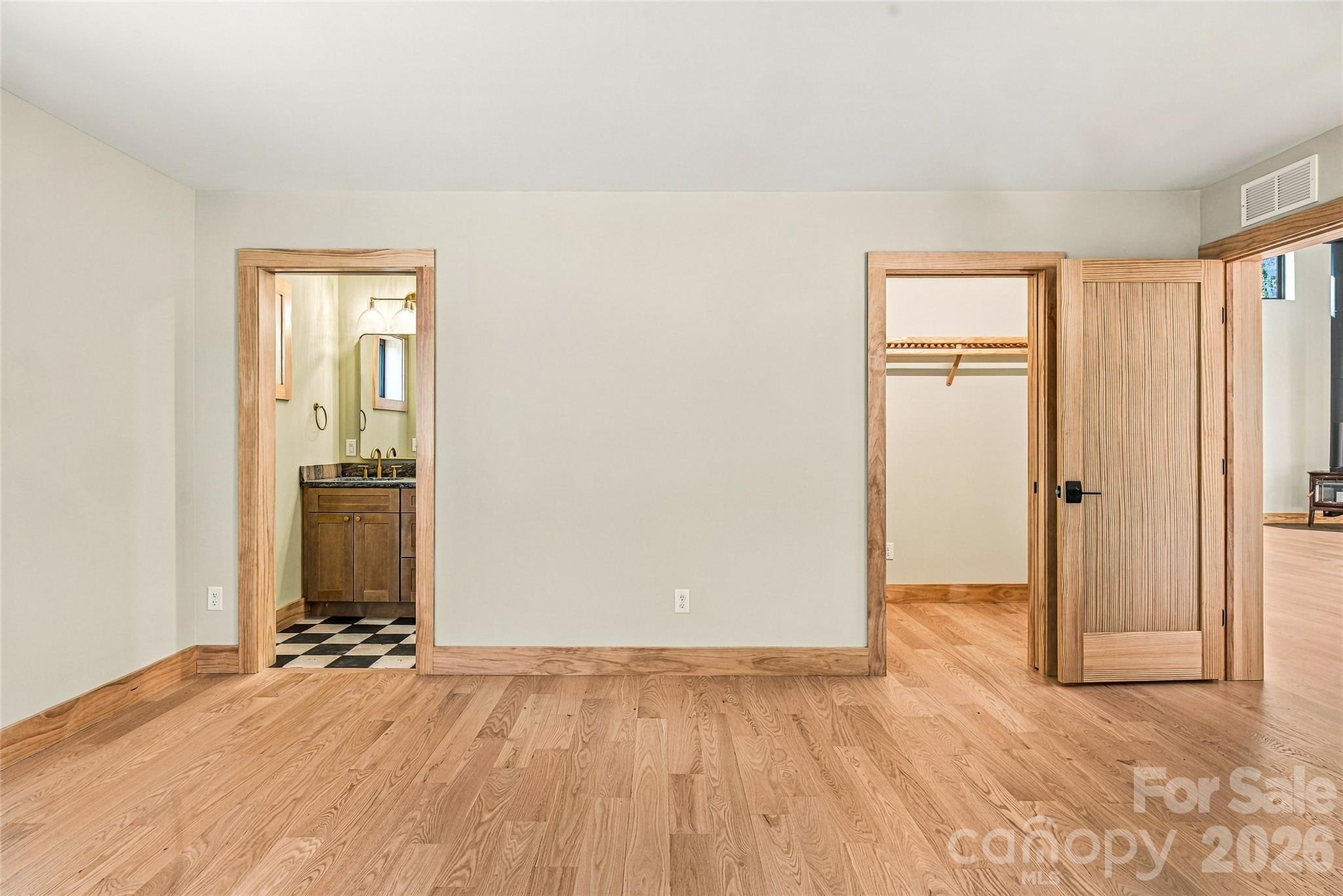 Clean, timeless finishes and solid wood interior doors. - 205 Blue Moon Lane, Candler