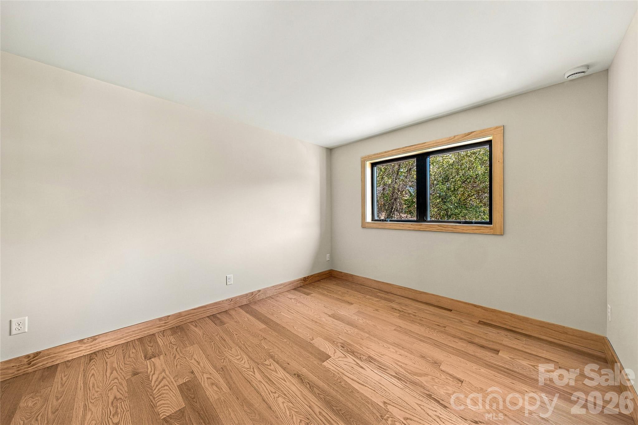Light-filled bedroom with peaceful wooded views. - 205 Blue Moon Lane, Candler