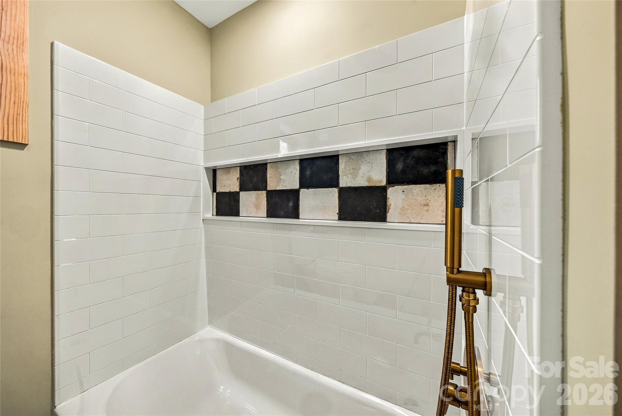 Beautiful tilework and stylish fixtures in the second bath. - 205 Blue Moon Lane, Candler