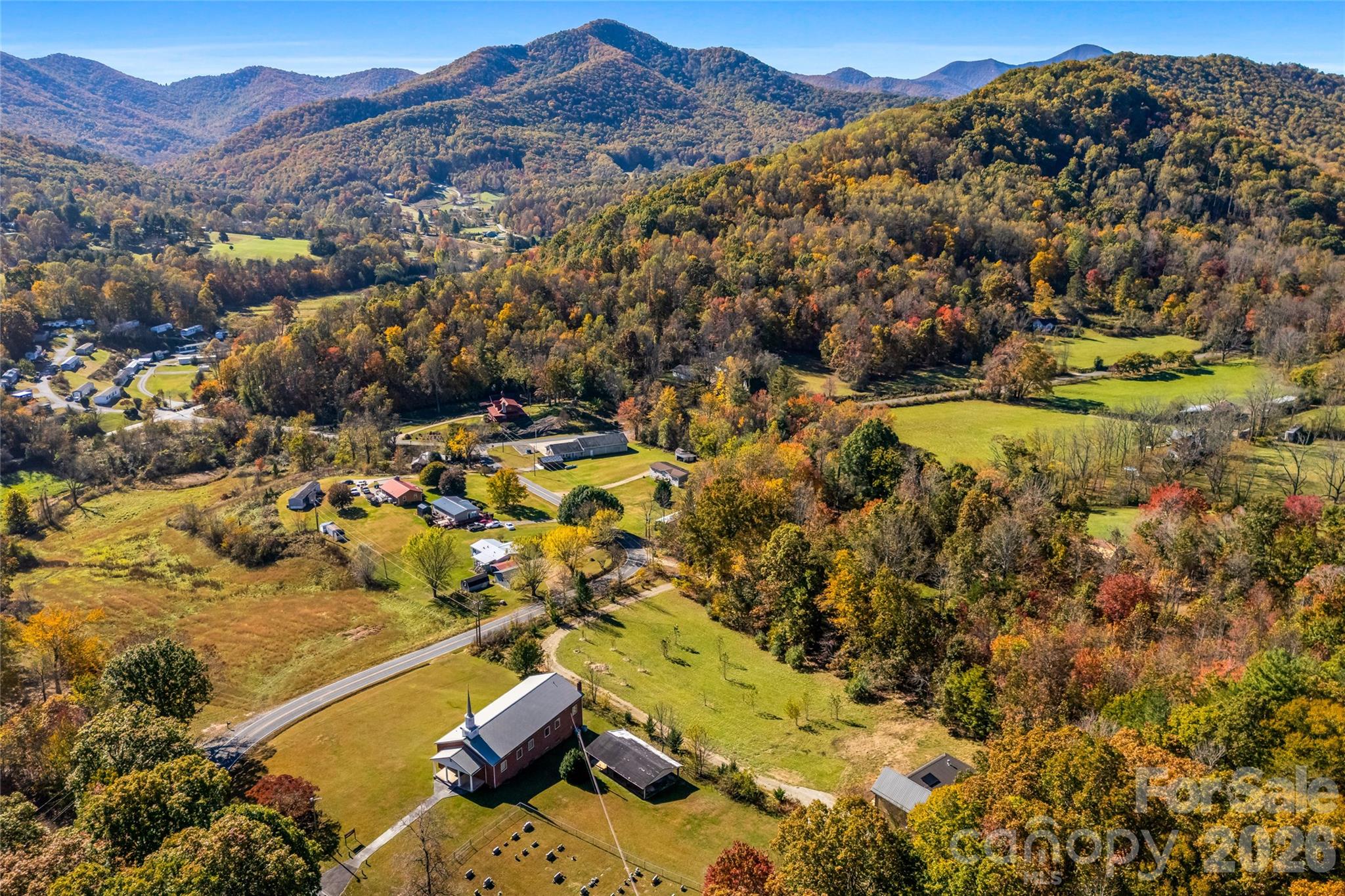 An idyllic setting surrounded by rolling countryside and mountains. - 205 Blue Moon Lane, Candler