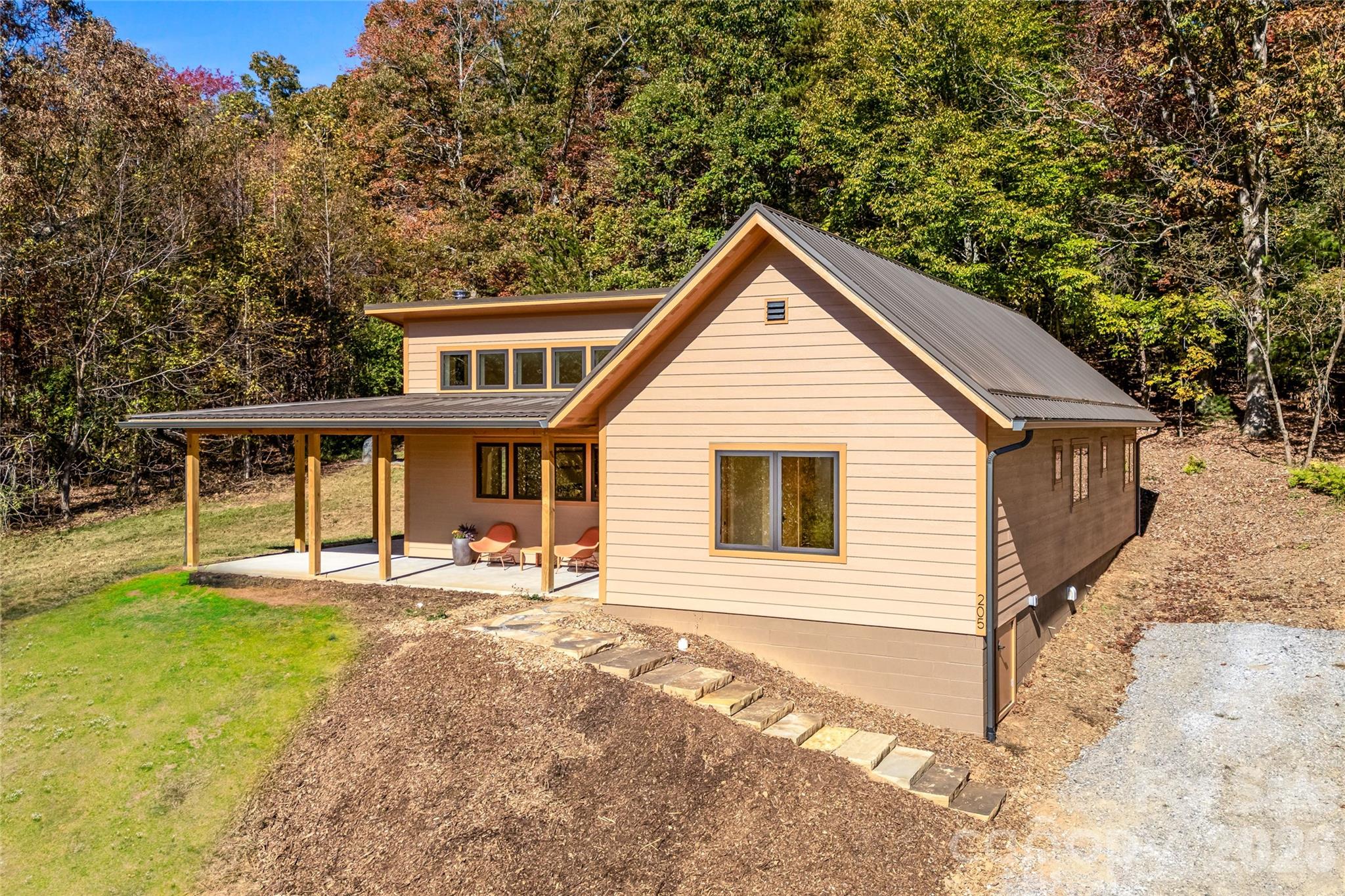 Exceptional craftsmanship meets sustainable, energy-efficient design. - 205 Blue Moon Lane, Candler