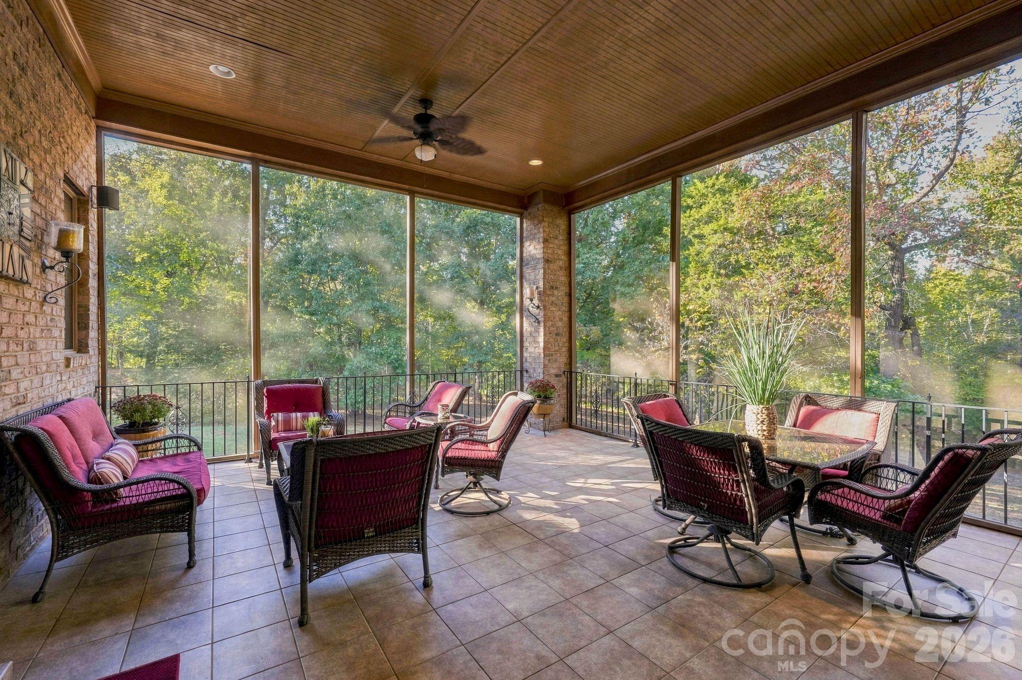 Screened in deck off the kitchen and living room (main level) - 8407 Rolling Fields Road, Mint Hill