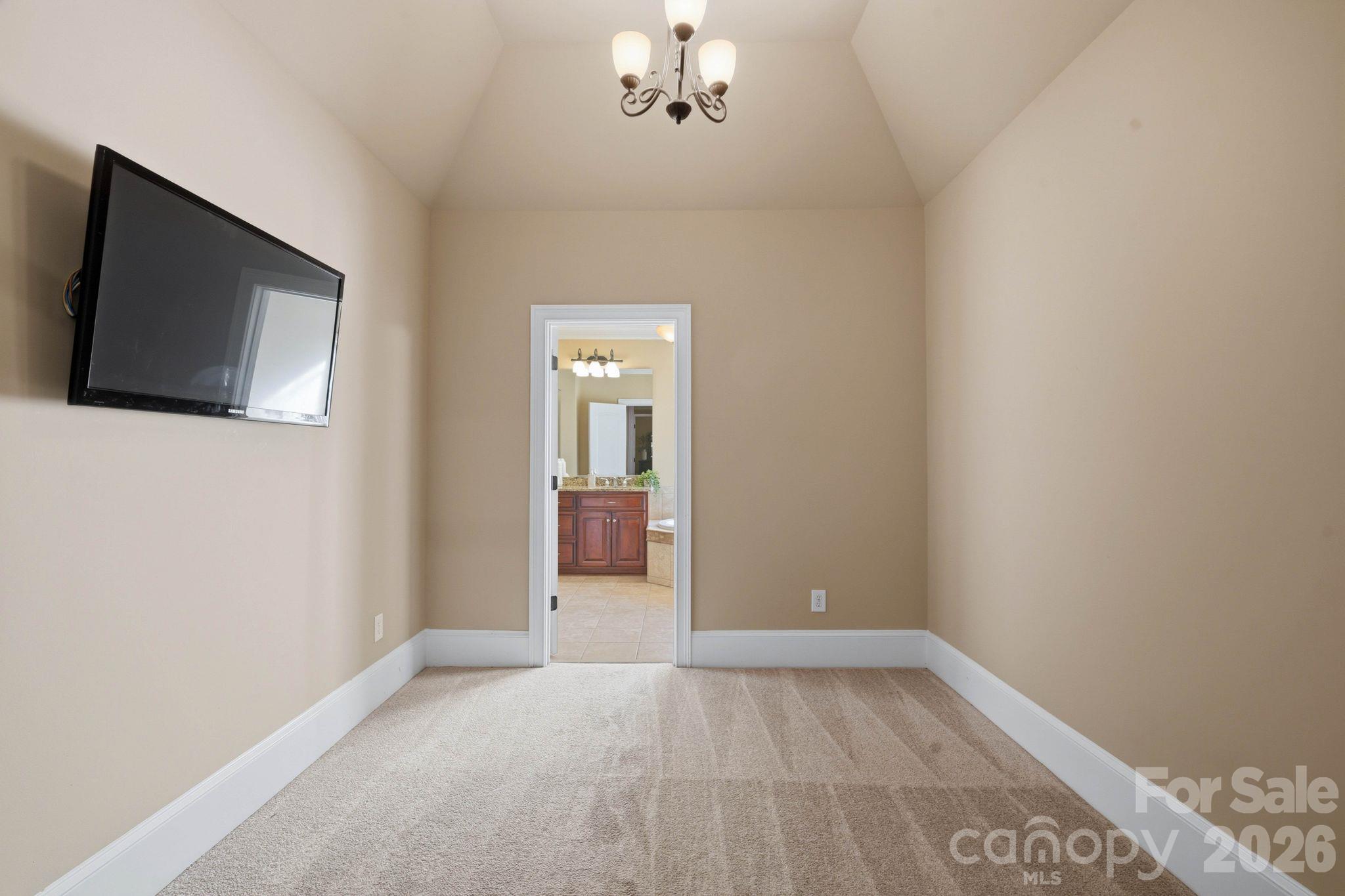 Primary bedroom lounge area (upper level) - 8407 Rolling Fields Road, Mint Hill