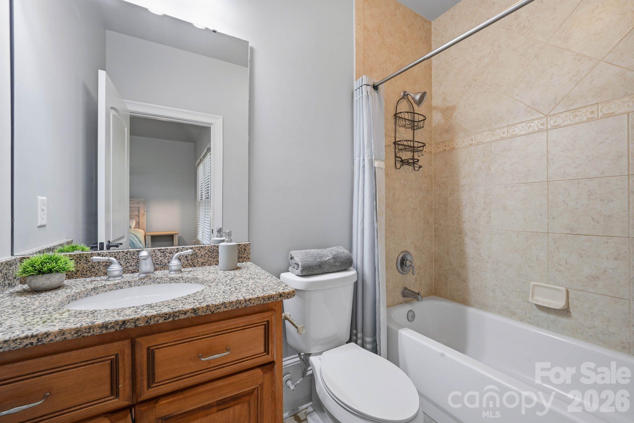 Guest suite bathroom (upper level) - 8407 Rolling Fields Road, Mint Hill