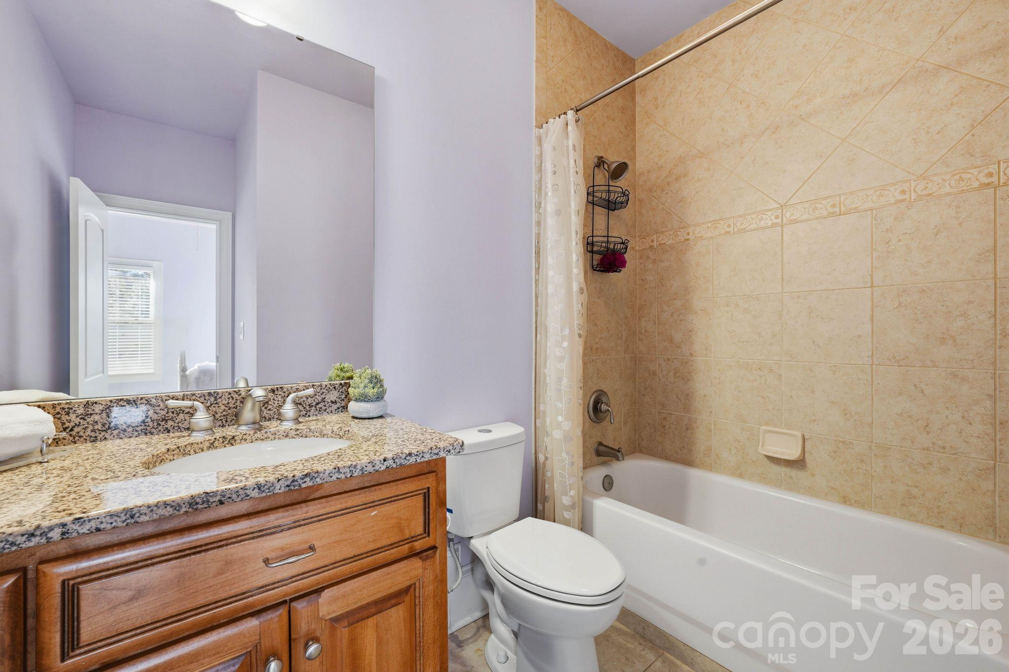 Guest suite bathroom (upper level) - 8407 Rolling Fields Road, Mint Hill