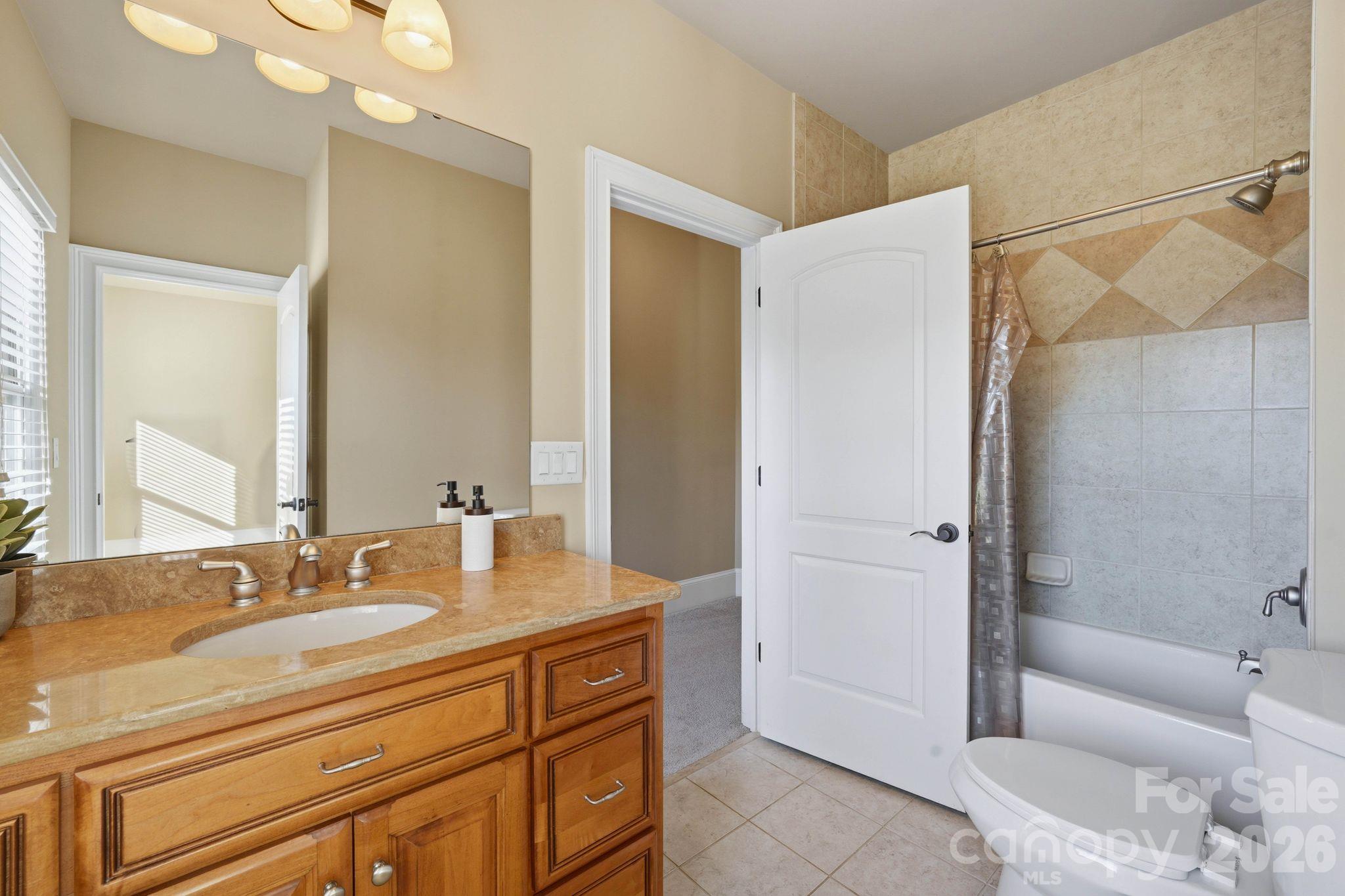 Guest suite bathroom (upper level) - 8407 Rolling Fields Road, Mint Hill