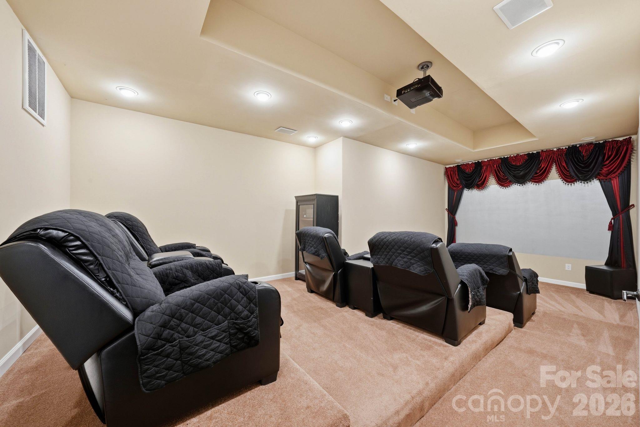 Home theater (lower level) - 8407 Rolling Fields Road, Mint Hill