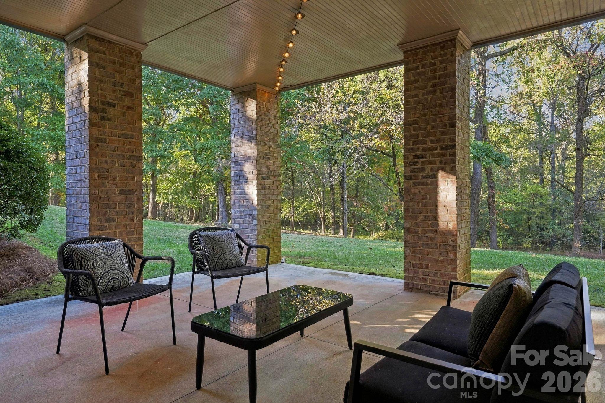 Outdoor patio (lower level) - 8407 Rolling Fields Road, Mint Hill