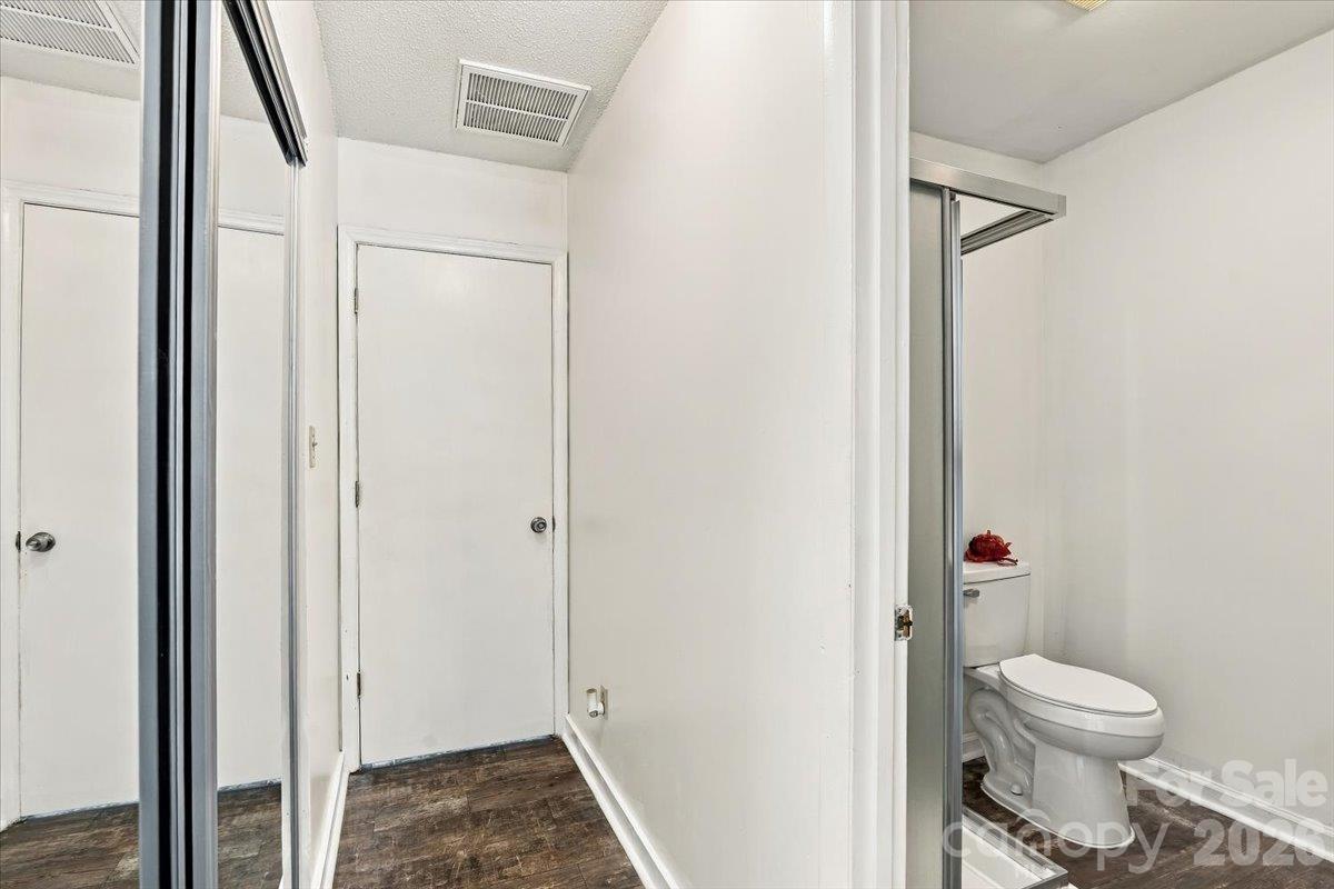 Door gives privacy creating another primary en suite option! - 11 Spring Lake Drive, Fletcher