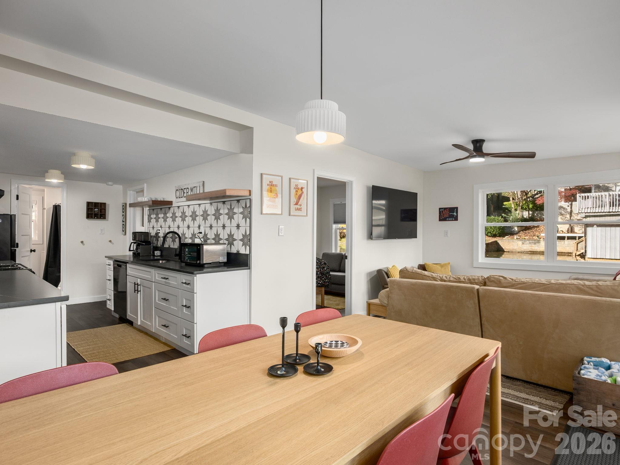 Effortless Flow from the Kitchen, Dining, to the Living Area - 1942 Memorial Highway, Lake Lure