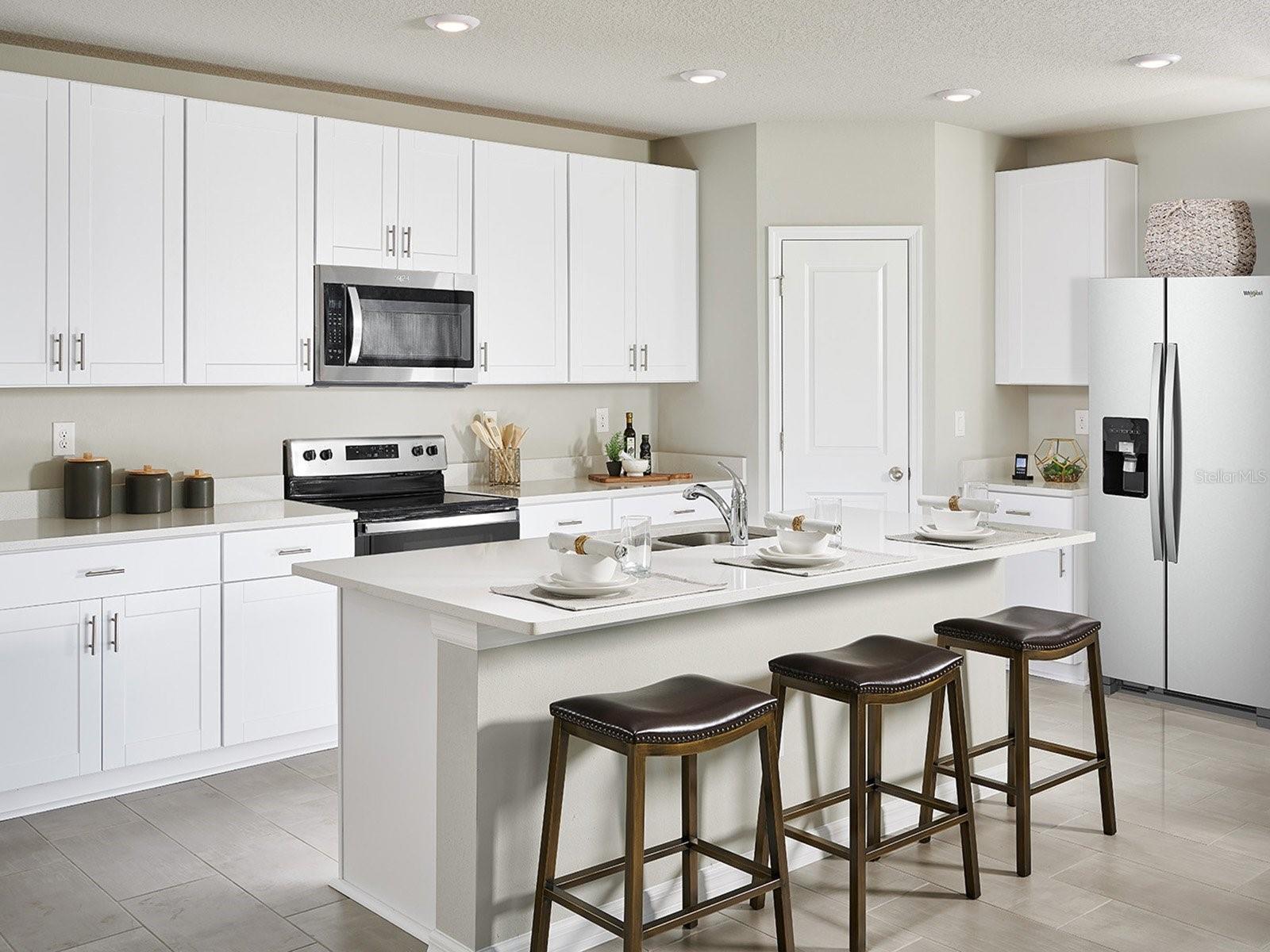 Welcome to Hamilton Bluff, where spacious living and timeless style come together in a thoughtfully designed home. This versatile floorplan features four generously sized bedrooms, three full baths, and a welcoming family room, offering exceptional flexibility for growing families and modern lifestyles. At the heart of the home, the open-concept kitchen seamlessly connects to the dining area and expansive great room, creating an inviting space perfect for entertaining, hosting celebrations, or enjoying everyday moments with loved ones. Designed with both comfort and functionality in mind, this beautifully crafted home offers the perfect balance of warmth, convenience, and contemporary appeal. - 3937 GIORGIO DR, WINTER HAVEN