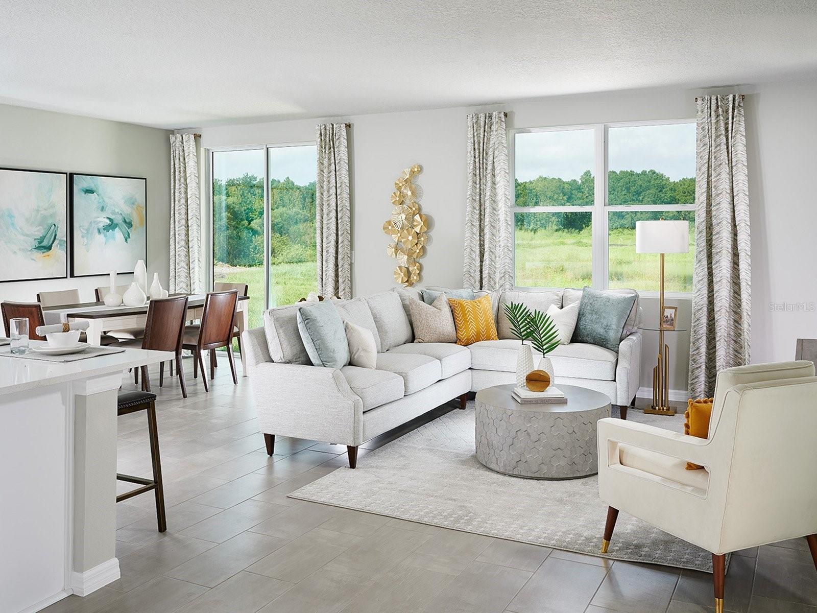 Welcome to Hamilton Bluff, where spacious living and timeless style come together in a thoughtfully designed home. This versatile floorplan features four generously sized bedrooms, three full baths, and a welcoming family room, offering exceptional flexibility for growing families and modern lifestyles. At the heart of the home, the open-concept kitchen seamlessly connects to the dining area and expansive great room, creating an inviting space perfect for entertaining, hosting celebrations, or enjoying everyday moments with loved ones. Designed with both comfort and functionality in mind, this beautifully crafted home offers the perfect balance of warmth, convenience, and contemporary appeal. - 3937 GIORGIO DR, WINTER HAVEN
