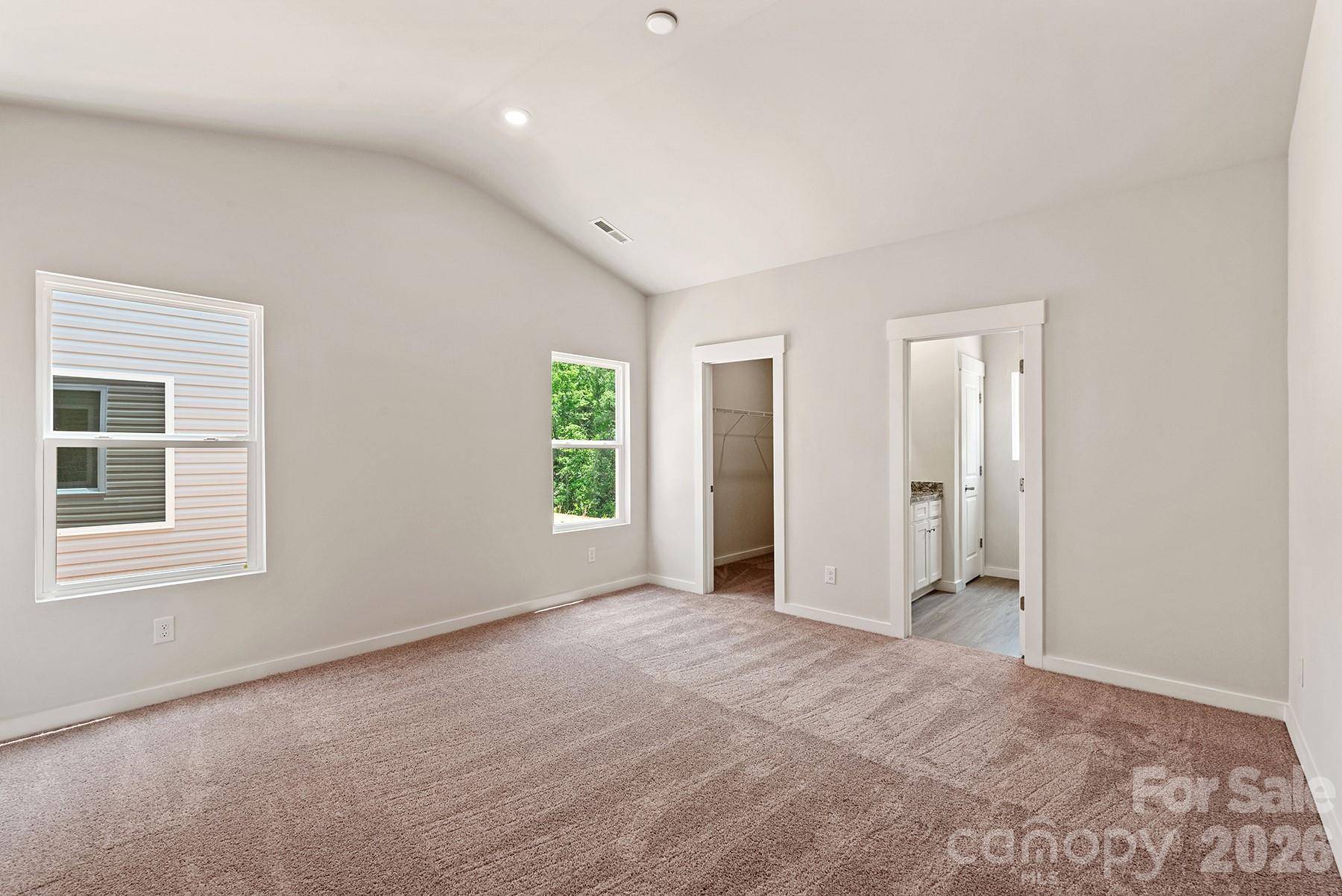Bright and inviting primary suite designed for comfort and relaxation. - 1426 Tristen Road, Richburg