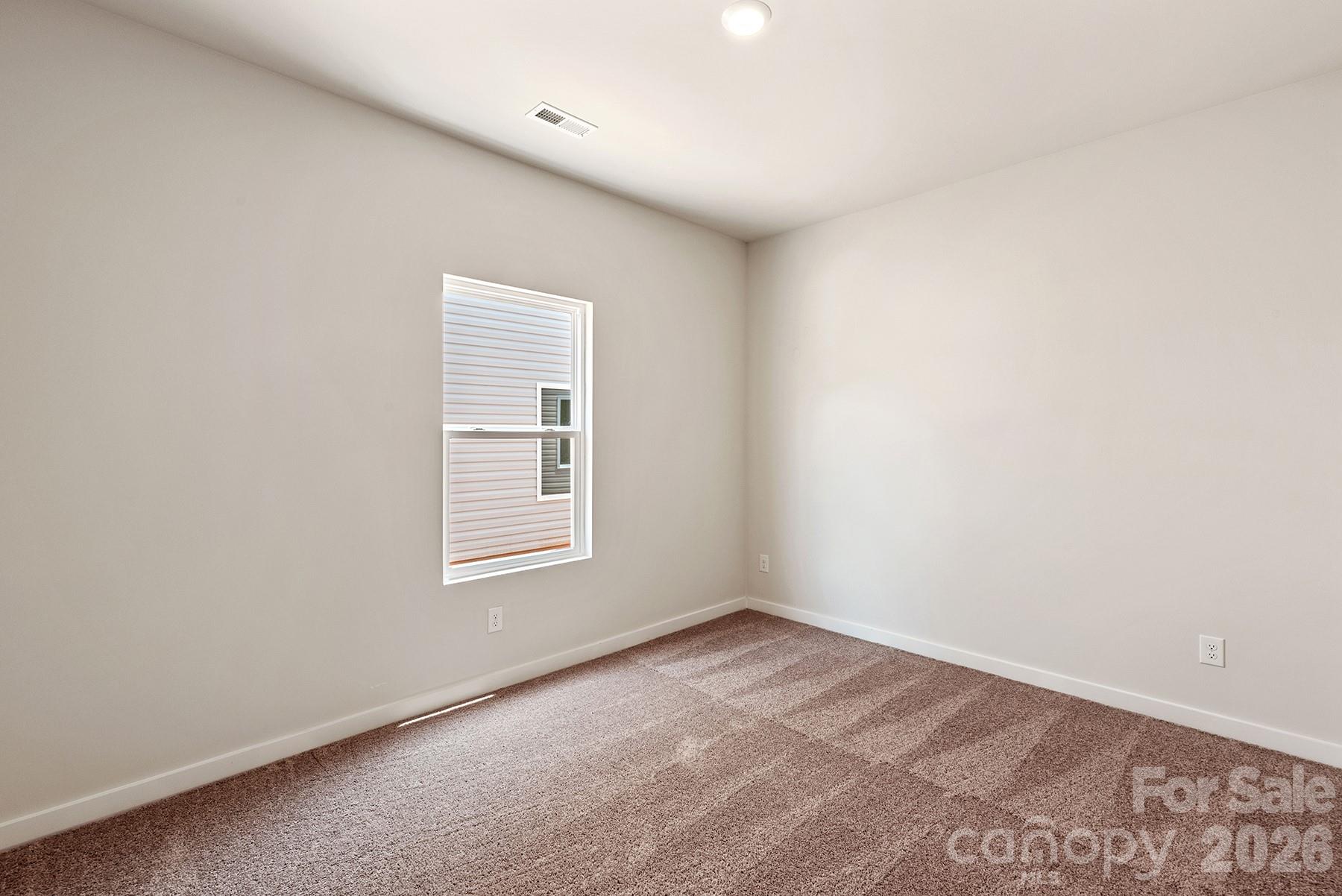 Third bedroom offers versatility for guests, work, or hobbies. - 1426 Tristen Road, Richburg
