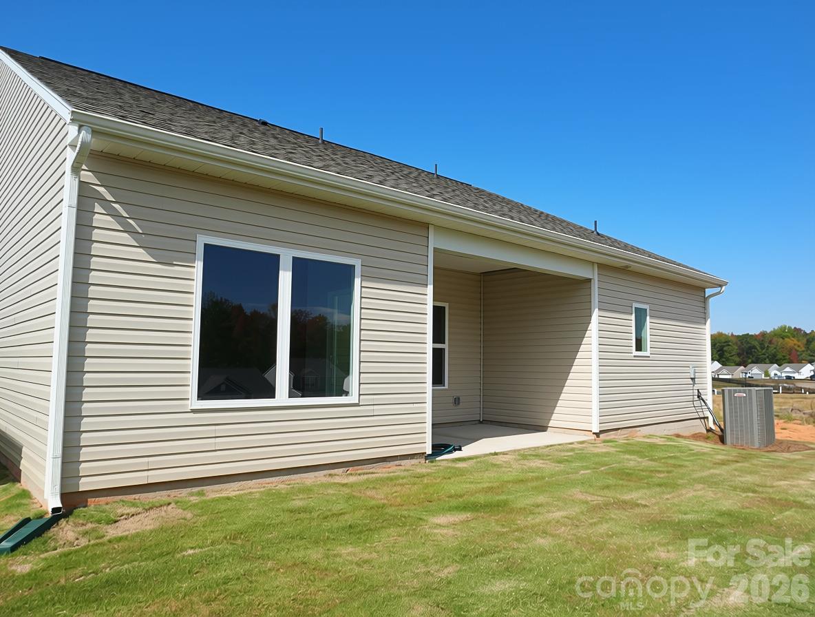 Enjoy the outdoors from the comfort of the covered back patio. - 1426 Tristen Road, Richburg