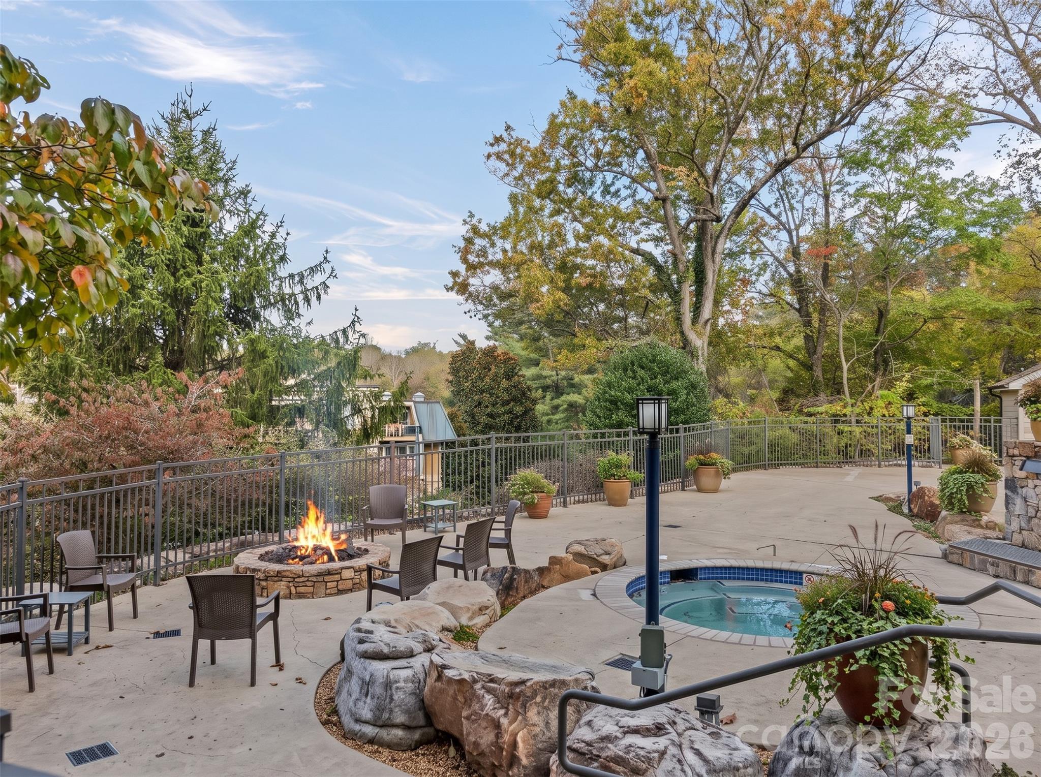 Virtually staged: Fire added. Planters filled. - 127 Bowling Park Road, Asheville