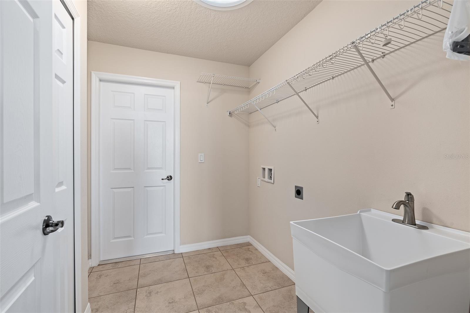 Laundry with Storage - 146 ARENA LAKE DR, PALM COAST